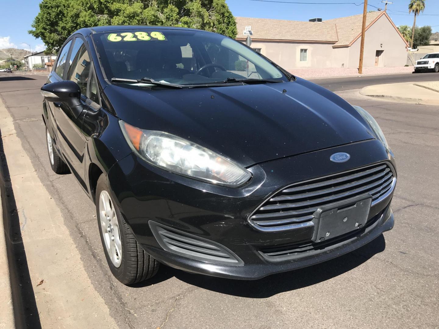 2016 black /gray Ford Fiesta SE Hatchback (3FADP4EJ6GM) with an 1.6L L4 DOHC 16V engine, automatic transmission, located at 323 E Dunlap Ave., Phoenix, AZ, 85020, (602) 331-9000, 33.567677, -112.069000 - 2016 Ford Fiesta SE,.....A Must See!!...Automatic, 1.6L Engine, Super Economical -- 160k miles .... Ice cold AC. The car is gorgeous inside and out. Power windows, Power door locks, Stereo/ CD Player, Phone sync, Bluetooth, Beautiful black exterior with gray cloth seats in near perfect condition, Cl - Photo#4
