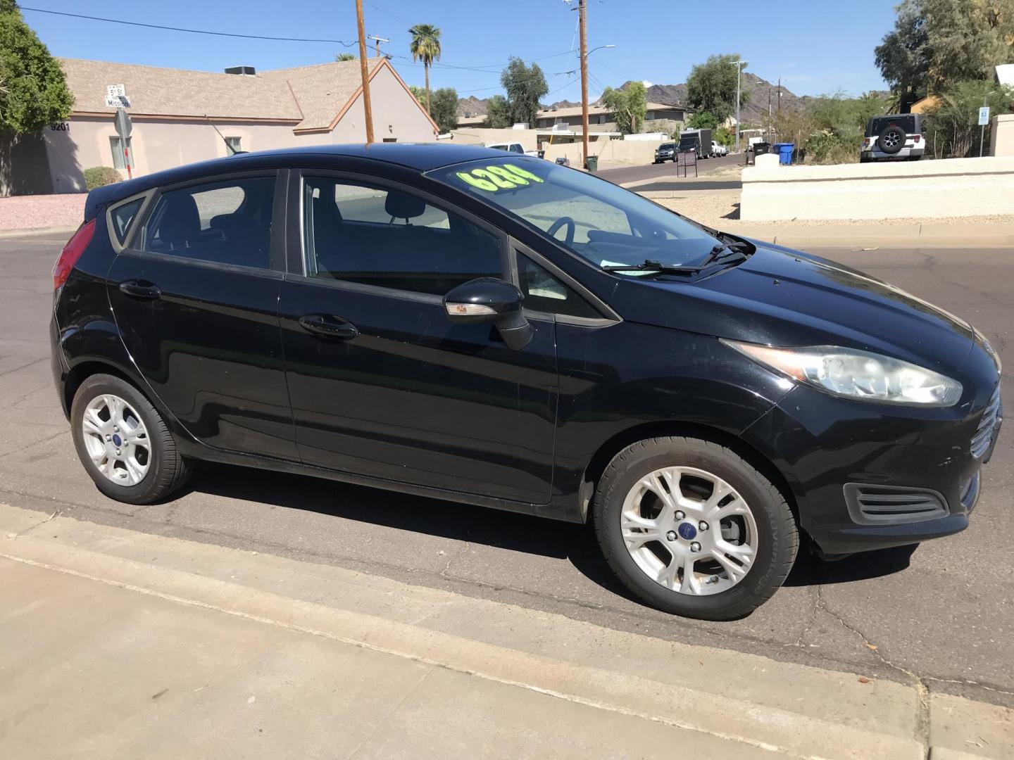 2016 black /gray Ford Fiesta SE Hatchback (3FADP4EJ6GM) with an 1.6L L4 DOHC 16V engine, automatic transmission, located at 323 E Dunlap Ave., Phoenix, AZ, 85020, (602) 331-9000, 33.567677, -112.069000 - 2016 Ford Fiesta SE,.....A Must See!!...Automatic, 1.6L Engine, Super Economical -- 160k miles .... Ice cold AC. The car is gorgeous inside and out. Power windows, Power door locks, Stereo/ CD Player, Phone sync, Bluetooth, Beautiful black exterior with gray cloth seats in near perfect condition, Cl - Photo#6