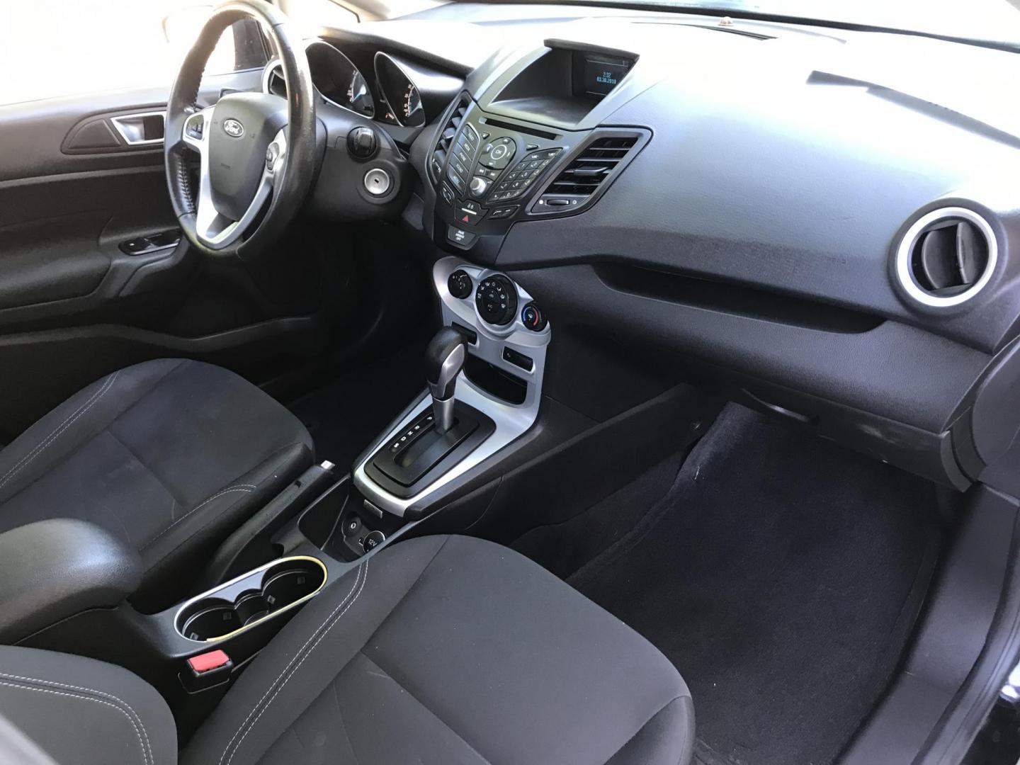 2016 black /gray Ford Fiesta SE Hatchback (3FADP4EJ6GM) with an 1.6L L4 DOHC 16V engine, automatic transmission, located at 323 E Dunlap Ave., Phoenix, AZ, 85020, (602) 331-9000, 33.567677, -112.069000 - 2016 Ford Fiesta SE,.....A Must See!!...Automatic, 1.6L Engine, Super Economical -- 160k miles .... Ice cold AC. The car is gorgeous inside and out. Power windows, Power door locks, Stereo/ CD Player, Phone sync, Bluetooth, Beautiful black exterior with gray cloth seats in near perfect condition, Cl - Photo#7