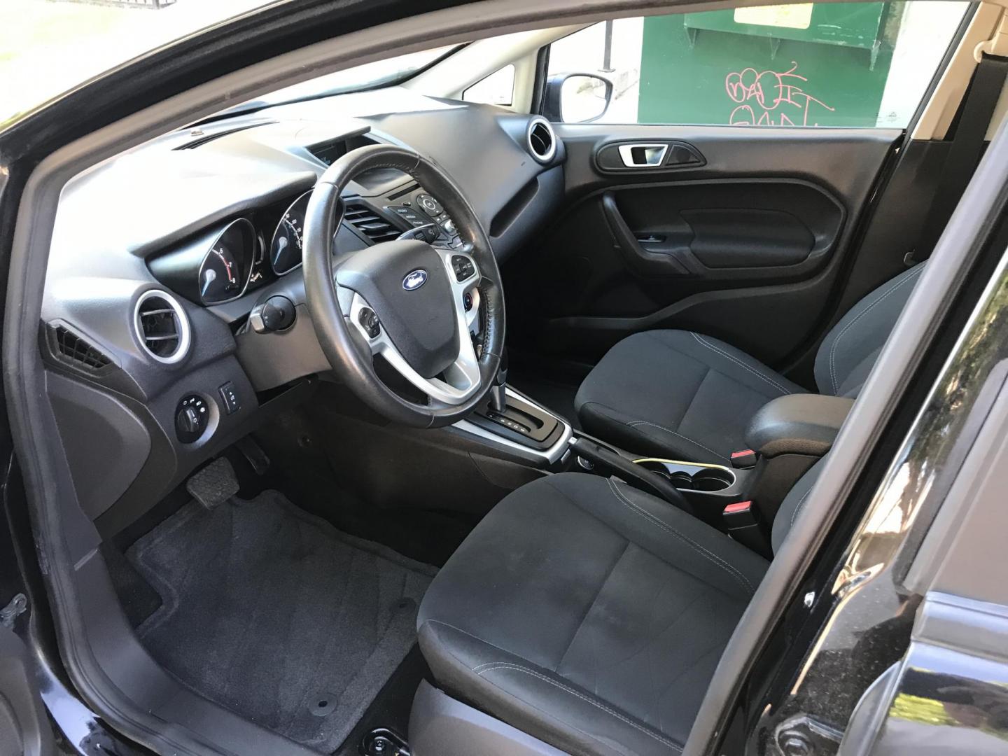 2016 black /gray Ford Fiesta SE Hatchback (3FADP4EJ6GM) with an 1.6L L4 DOHC 16V engine, automatic transmission, located at 323 E Dunlap Ave., Phoenix, AZ, 85020, (602) 331-9000, 33.567677, -112.069000 - 2016 Ford Fiesta SE,.....A Must See!!...Automatic, 1.6L Engine, Super Economical -- 160k miles .... Ice cold AC. The car is gorgeous inside and out. Power windows, Power door locks, Stereo/ CD Player, Phone sync, Bluetooth, Beautiful black exterior with gray cloth seats in near perfect condition, Cl - Photo#11