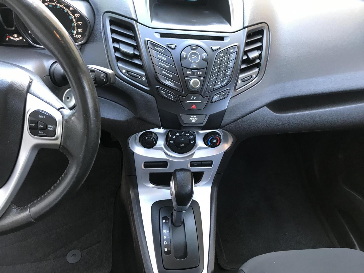 2016 black /gray Ford Fiesta SE Hatchback (3FADP4EJ6GM) with an 1.6L L4 DOHC 16V engine, automatic transmission, located at 323 E Dunlap Ave., Phoenix, AZ, 85020, (602) 331-9000, 33.567677, -112.069000 - 2016 Ford Fiesta SE,.....A Must See!!...Automatic, 1.6L Engine, Super Economical -- 160k miles .... Ice cold AC. The car is gorgeous inside and out. Power windows, Power door locks, Stereo/ CD Player, Phone sync, Bluetooth, Beautiful black exterior with gray cloth seats in near perfect condition, Cl - Photo#12