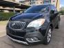 2013 black /black Buick Encore Leather FWD (KL4CJCSB7DB) with an 1.4L L4 DOHC 16V TURBO engine, 6-Speed Automatic transmission, located at 323 E Dunlap Ave., Phoenix, AZ, 85020, (602) 331-9000, 33.567677, -112.069000 - 2013 BUICK ENCORE SUV ........ Automatic, 1.4T Engine, 156k miles, Cold AC. Power Options, Premium Sound Stereo/ CD Player, Beautiful Black Exterior with black leather seats, Backup Camera, Alloy Wheels, Clean title , Runs and Drives great . passed emissions. Priced at $7495 ..... Great Economical - Photo#0