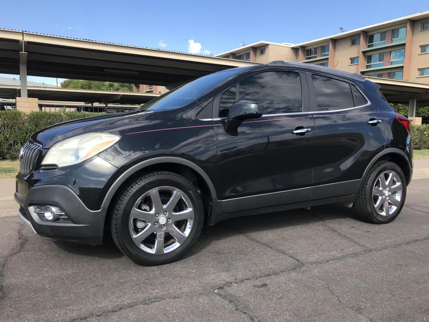 2013 black /black Buick Encore Leather FWD (KL4CJCSB7DB) with an 1.4L L4 DOHC 16V TURBO engine, 6-Speed Automatic transmission, located at 323 E Dunlap Ave., Phoenix, AZ, 85020, (602) 331-9000, 33.567677, -112.069000 - 2013 BUICK ENCORE SUV ........ Automatic, 1.4T Engine, 156k miles, Cold AC. Power Options, Premium Sound Stereo/ CD Player, Beautiful Black Exterior with black leather seats, Backup Camera, Alloy Wheels, Clean title , Runs and Drives great . passed emissions. Priced at $7495 ..... Great Economical - Photo#2