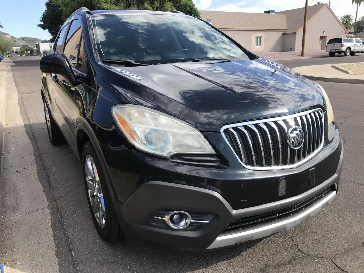 2013 black /black Buick Encore Leather FWD (KL4CJCSB7DB) with an 1.4L L4 DOHC 16V TURBO engine, 6-Speed Automatic transmission, located at 323 E Dunlap Ave., Phoenix, AZ, 85020, (602) 331-9000, 33.567677, -112.069000 - 2013 BUICK ENCORE SUV ........ Automatic, 1.4T Engine, 156k miles, Cold AC. Power Options, Premium Sound Stereo/ CD Player, Beautiful Black Exterior with black leather seats, Backup Camera, Alloy Wheels, Clean title , Runs and Drives great . passed emissions. Priced at $7495 ..... Great Economical - Photo#4