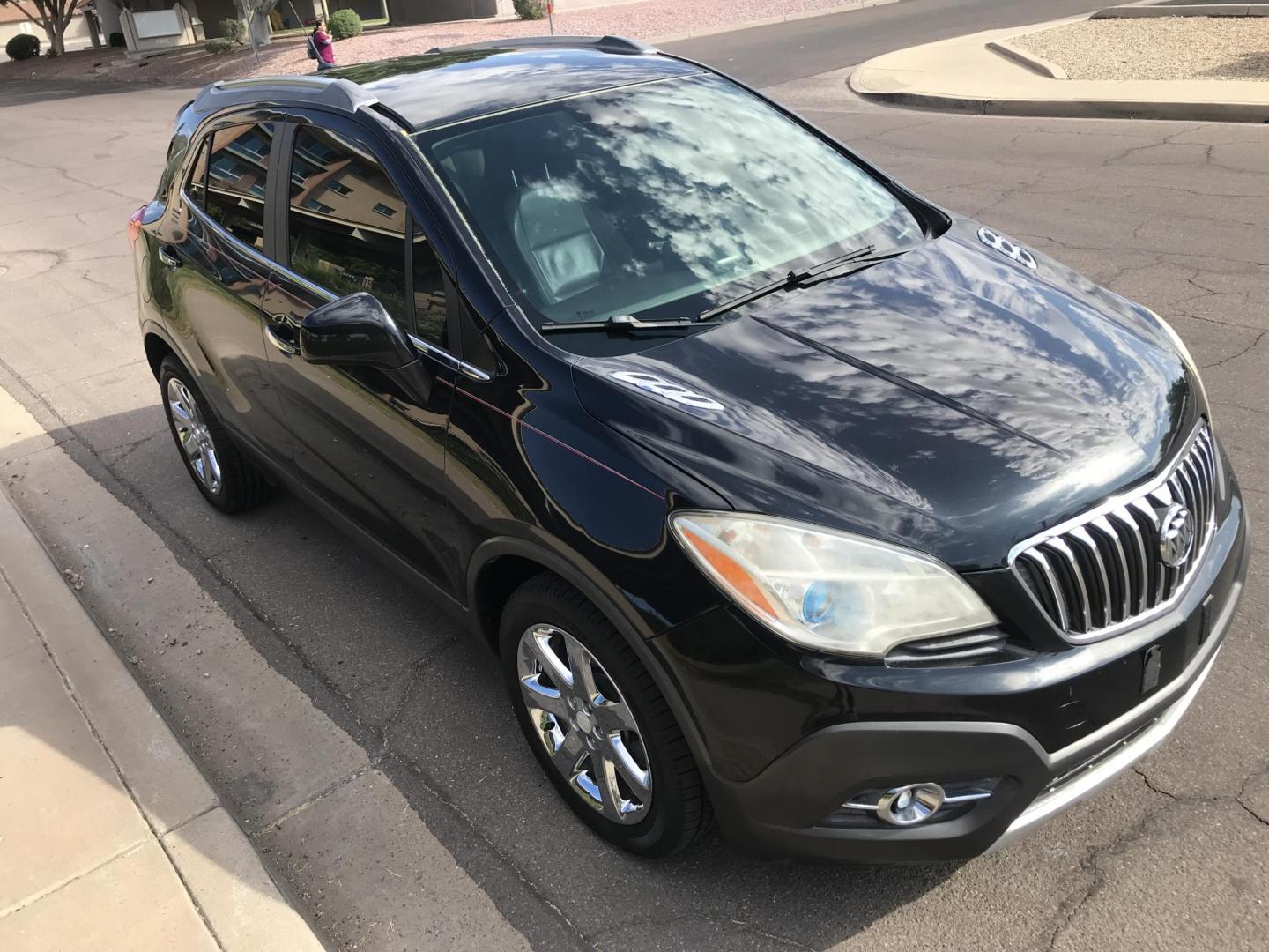 2013 black /black Buick Encore Leather FWD (KL4CJCSB7DB) with an 1.4L L4 DOHC 16V TURBO engine, 6-Speed Automatic transmission, located at 323 E Dunlap Ave., Phoenix, AZ, 85020, (602) 331-9000, 33.567677, -112.069000 - 2013 BUICK ENCORE SUV ........ Automatic, 1.4T Engine, 156k miles, Cold AC. Power Options, Premium Sound Stereo/ CD Player, Beautiful Black Exterior with black leather seats, Backup Camera, Alloy Wheels, Clean title , Runs and Drives great . passed emissions. Priced at $7495 ..... Great Economical - Photo#5