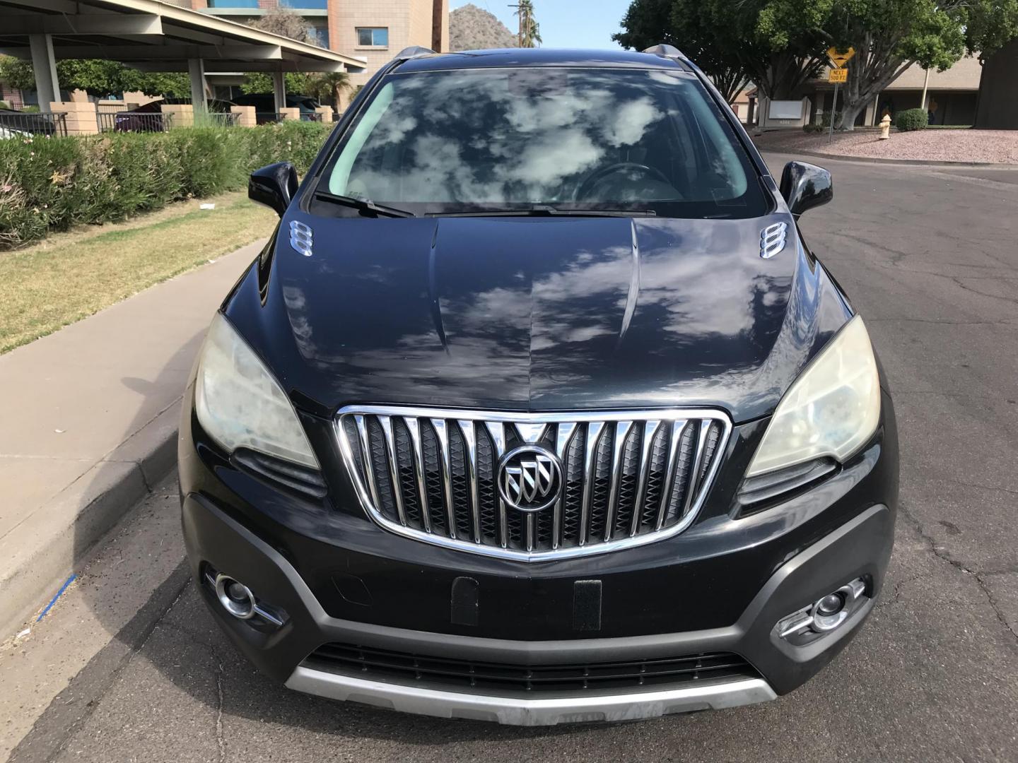 2013 black /black Buick Encore Leather FWD (KL4CJCSB7DB) with an 1.4L L4 DOHC 16V TURBO engine, 6-Speed Automatic transmission, located at 323 E Dunlap Ave., Phoenix, AZ, 85020, (602) 331-9000, 33.567677, -112.069000 - 2013 BUICK ENCORE SUV ........ Automatic, 1.4T Engine, 156k miles, Cold AC. Power Options, Premium Sound Stereo/ CD Player, Beautiful Black Exterior with black leather seats, Backup Camera, Alloy Wheels, Clean title , Runs and Drives great . passed emissions. Priced at $7495 ..... Great Economical - Photo#3