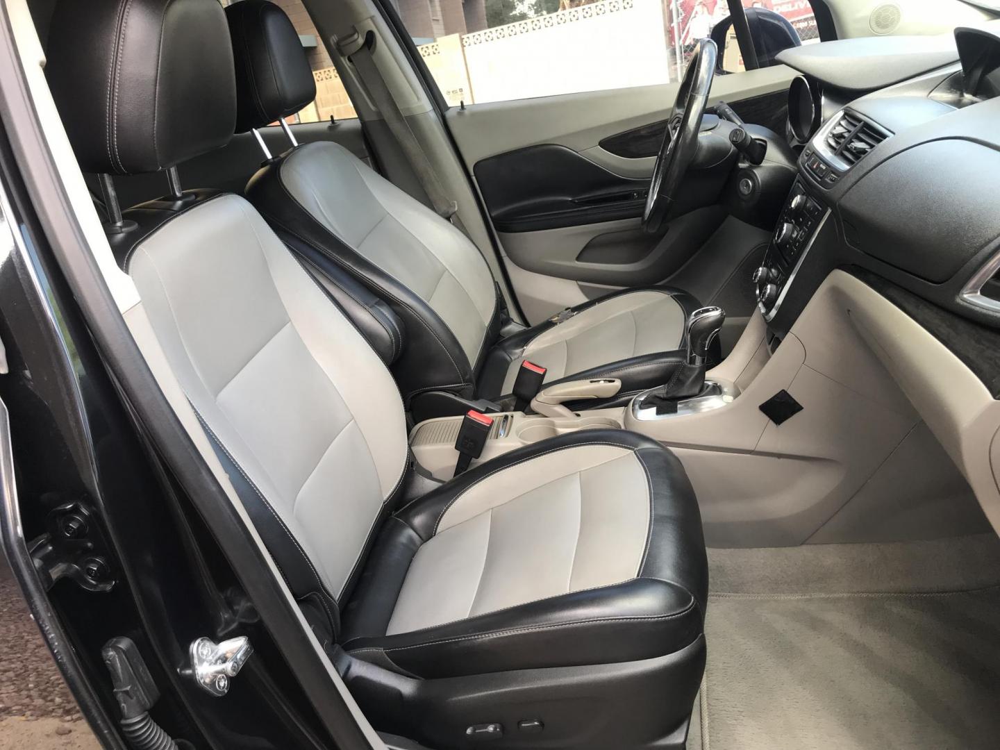 2013 black /black Buick Encore Leather FWD (KL4CJCSB7DB) with an 1.4L L4 DOHC 16V TURBO engine, 6-Speed Automatic transmission, located at 323 E Dunlap Ave., Phoenix, AZ, 85020, (602) 331-9000, 33.567677, -112.069000 - 2013 BUICK ENCORE SUV ........ Automatic, 1.4T Engine, 156k miles, Cold AC. Power Options, Premium Sound Stereo/ CD Player, Beautiful Black Exterior with black leather seats, Backup Camera, Alloy Wheels, Clean title , Runs and Drives great . passed emissions. Priced at $7495 ..... Great Economical - Photo#8