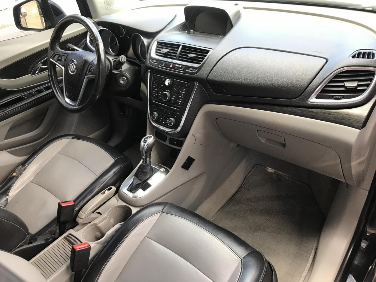 2013 black /black Buick Encore Leather FWD (KL4CJCSB7DB) with an 1.4L L4 DOHC 16V TURBO engine, 6-Speed Automatic transmission, located at 323 E Dunlap Ave., Phoenix, AZ, 85020, (602) 331-9000, 33.567677, -112.069000 - 2013 BUICK ENCORE SUV ........ Automatic, 1.4T Engine, 156k miles, Cold AC. Power Options, Premium Sound Stereo/ CD Player, Beautiful Black Exterior with black leather seats, Backup Camera, Alloy Wheels, Clean title , Runs and Drives great . passed emissions. Priced at $7495 ..... Great Economical - Photo#7