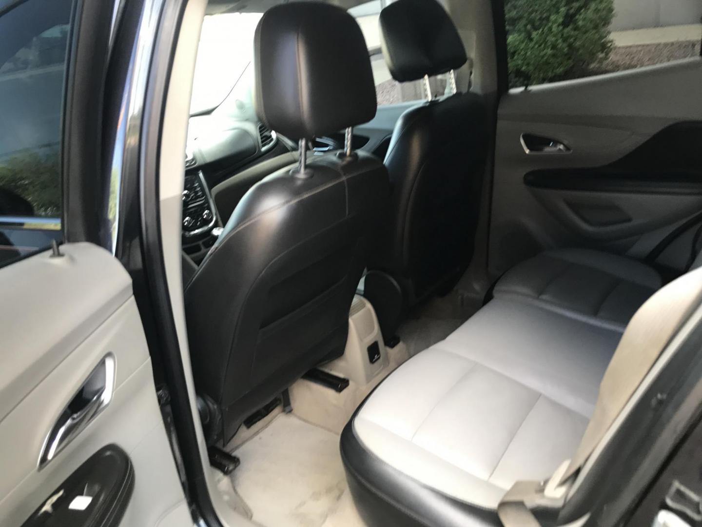 2013 black /black Buick Encore Leather FWD (KL4CJCSB7DB) with an 1.4L L4 DOHC 16V TURBO engine, 6-Speed Automatic transmission, located at 323 E Dunlap Ave., Phoenix, AZ, 85020, (602) 331-9000, 33.567677, -112.069000 - 2013 BUICK ENCORE SUV ........ Automatic, 1.4T Engine, 156k miles, Cold AC. Power Options, Premium Sound Stereo/ CD Player, Beautiful Black Exterior with black leather seats, Backup Camera, Alloy Wheels, Clean title , Runs and Drives great . passed emissions. Priced at $7495 ..... Great Economical - Photo#11