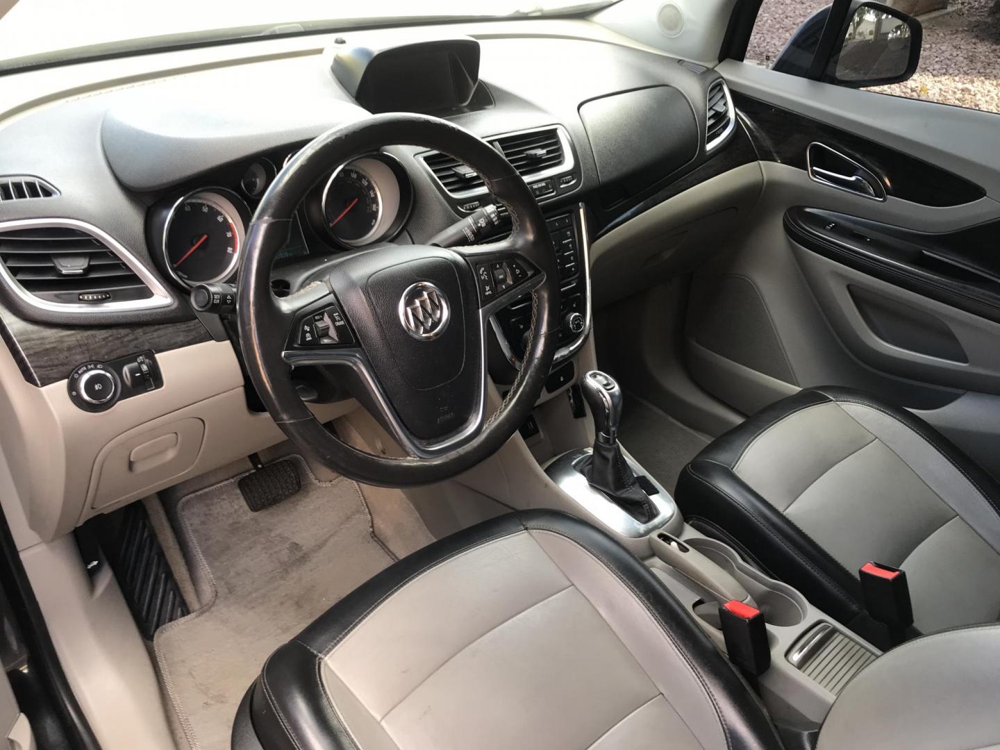 2013 black /black Buick Encore Leather FWD (KL4CJCSB7DB) with an 1.4L L4 DOHC 16V TURBO engine, 6-Speed Automatic transmission, located at 323 E Dunlap Ave., Phoenix, AZ, 85020, (602) 331-9000, 33.567677, -112.069000 - 2013 BUICK ENCORE SUV ........ Automatic, 1.4T Engine, 156k miles, Cold AC. Power Options, Premium Sound Stereo/ CD Player, Beautiful Black Exterior with black leather seats, Backup Camera, Alloy Wheels, Clean title , Runs and Drives great . passed emissions. Priced at $7495 ..... Great Economical - Photo#12