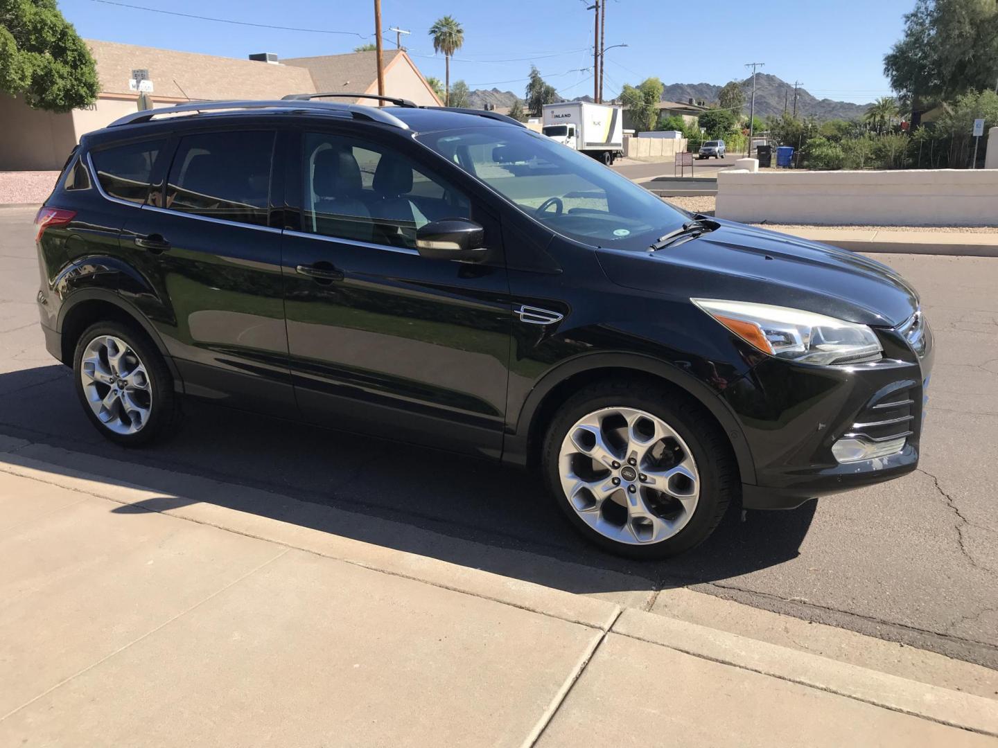 2013 black /black Ford Escape Titanium 4WD (1FMCU9J97DU) with an 2.0L L4 DOHC 16V engine, 6-Speed Automatic transmission, located at 323 E Dunlap Ave., Phoenix, AZ, 85020, (602) 331-9000, 33.567677, -112.069000 - Photo#6