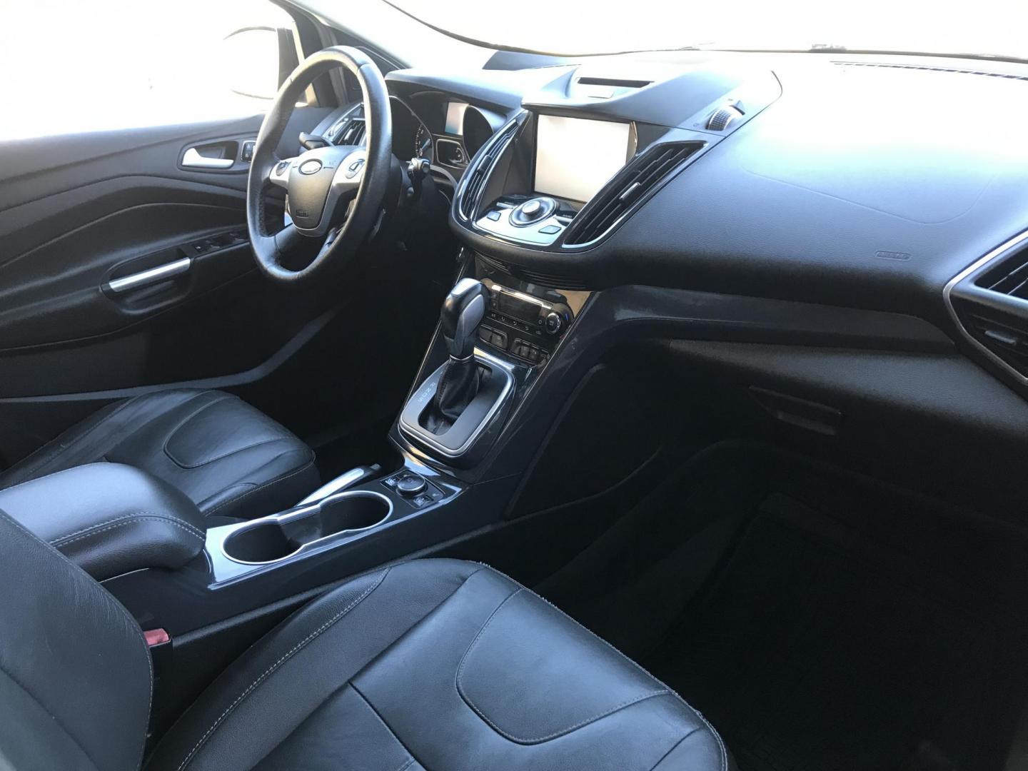 2013 black /black Ford Escape Titanium 4WD (1FMCU9J97DU) with an 2.0L L4 DOHC 16V engine, 6-Speed Automatic transmission, located at 323 E Dunlap Ave., Phoenix, AZ, 85020, (602) 331-9000, 33.567677, -112.069000 - Photo#7