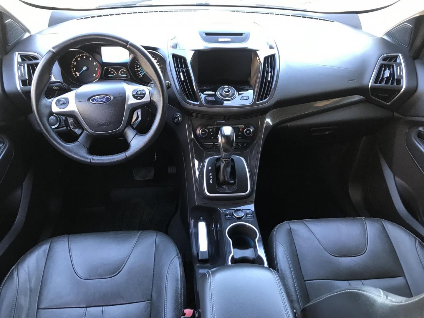 2013 black /black Ford Escape Titanium 4WD (1FMCU9J97DU) with an 2.0L L4 DOHC 16V engine, 6-Speed Automatic transmission, located at 323 E Dunlap Ave., Phoenix, AZ, 85020, (602) 331-9000, 33.567677, -112.069000 - Photo#10