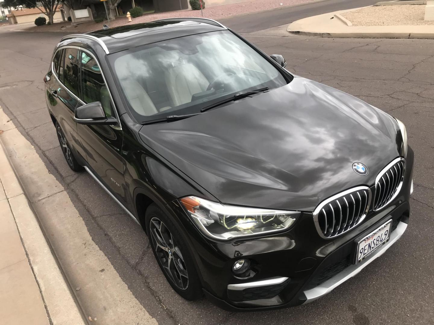 2016 black /black BMW X1 xDrive28i (WBXHT3C31G5) with an 2.0L L4 DOHC 16V engine, 8A transmission, located at 323 E Dunlap Ave., Phoenix, AZ, 85020, (602) 331-9000, 33.567677, -112.069000 - Photo#5