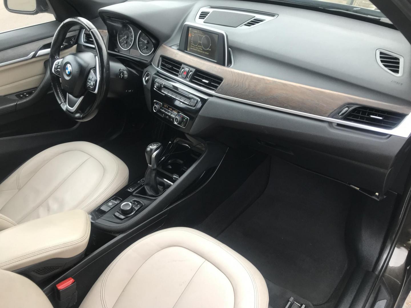 2016 black /black BMW X1 xDrive28i (WBXHT3C31G5) with an 2.0L L4 DOHC 16V engine, 8A transmission, located at 323 E Dunlap Ave., Phoenix, AZ, 85020, (602) 331-9000, 33.567677, -112.069000 - Photo#7