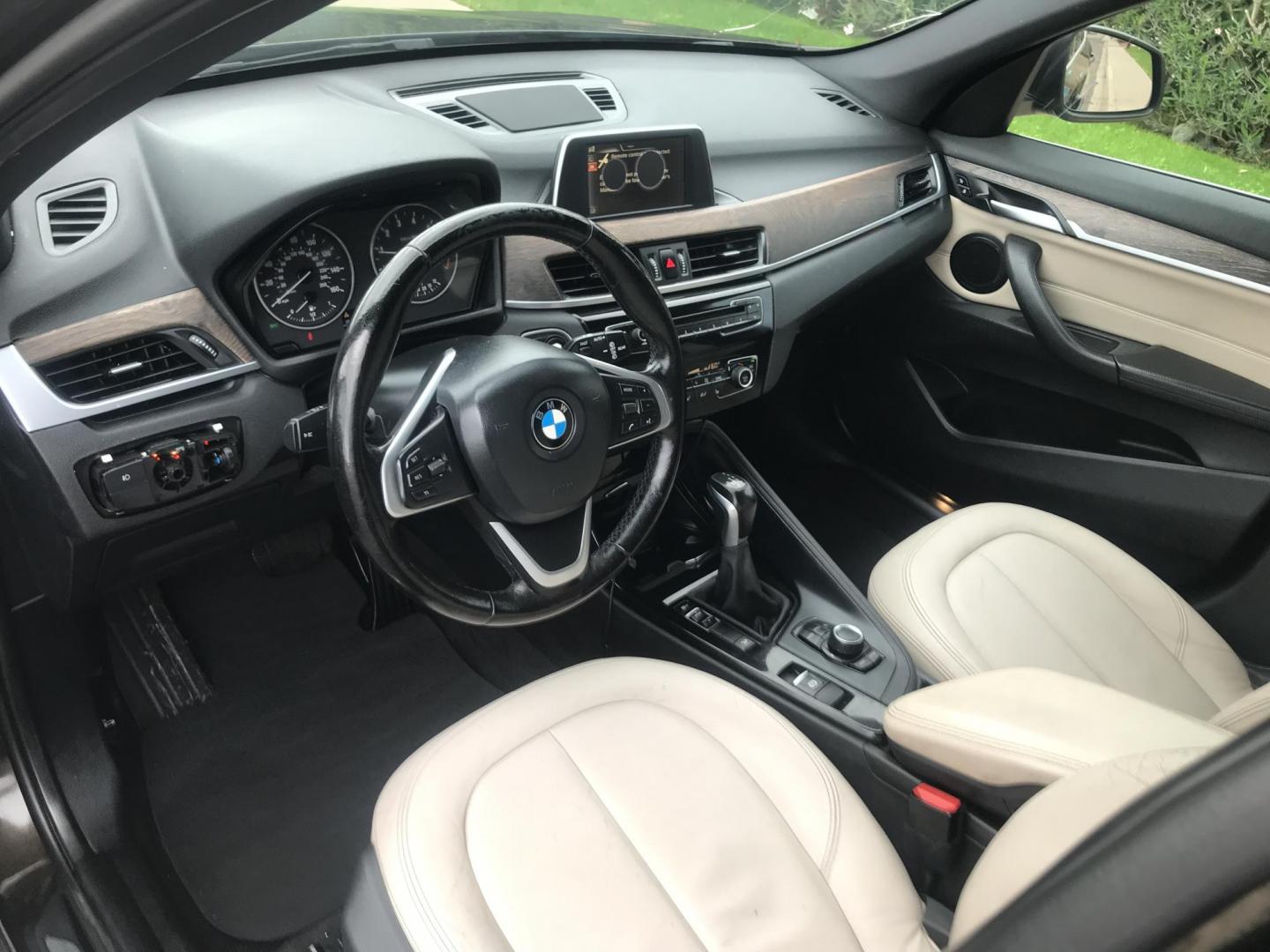 2016 black /black BMW X1 xDrive28i (WBXHT3C31G5) with an 2.0L L4 DOHC 16V engine, 8A transmission, located at 323 E Dunlap Ave., Phoenix, AZ, 85020, (602) 331-9000, 33.567677, -112.069000 - Photo#12