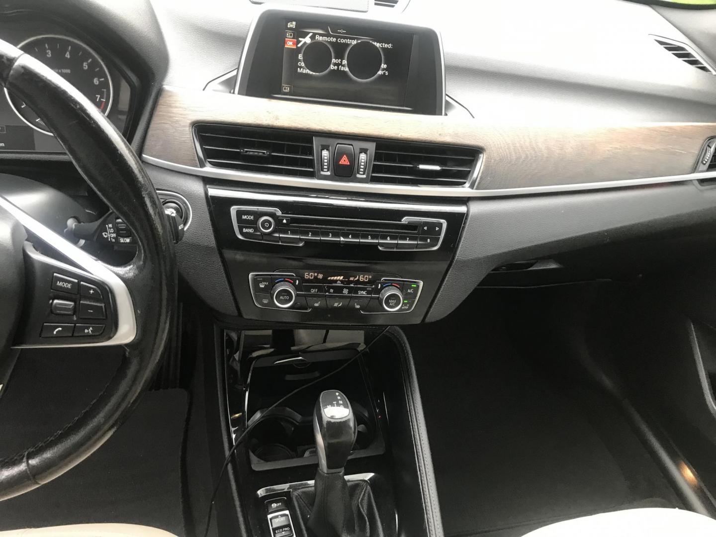 2016 black /black BMW X1 xDrive28i (WBXHT3C31G5) with an 2.0L L4 DOHC 16V engine, 8A transmission, located at 323 E Dunlap Ave., Phoenix, AZ, 85020, (602) 331-9000, 33.567677, -112.069000 - Photo#14