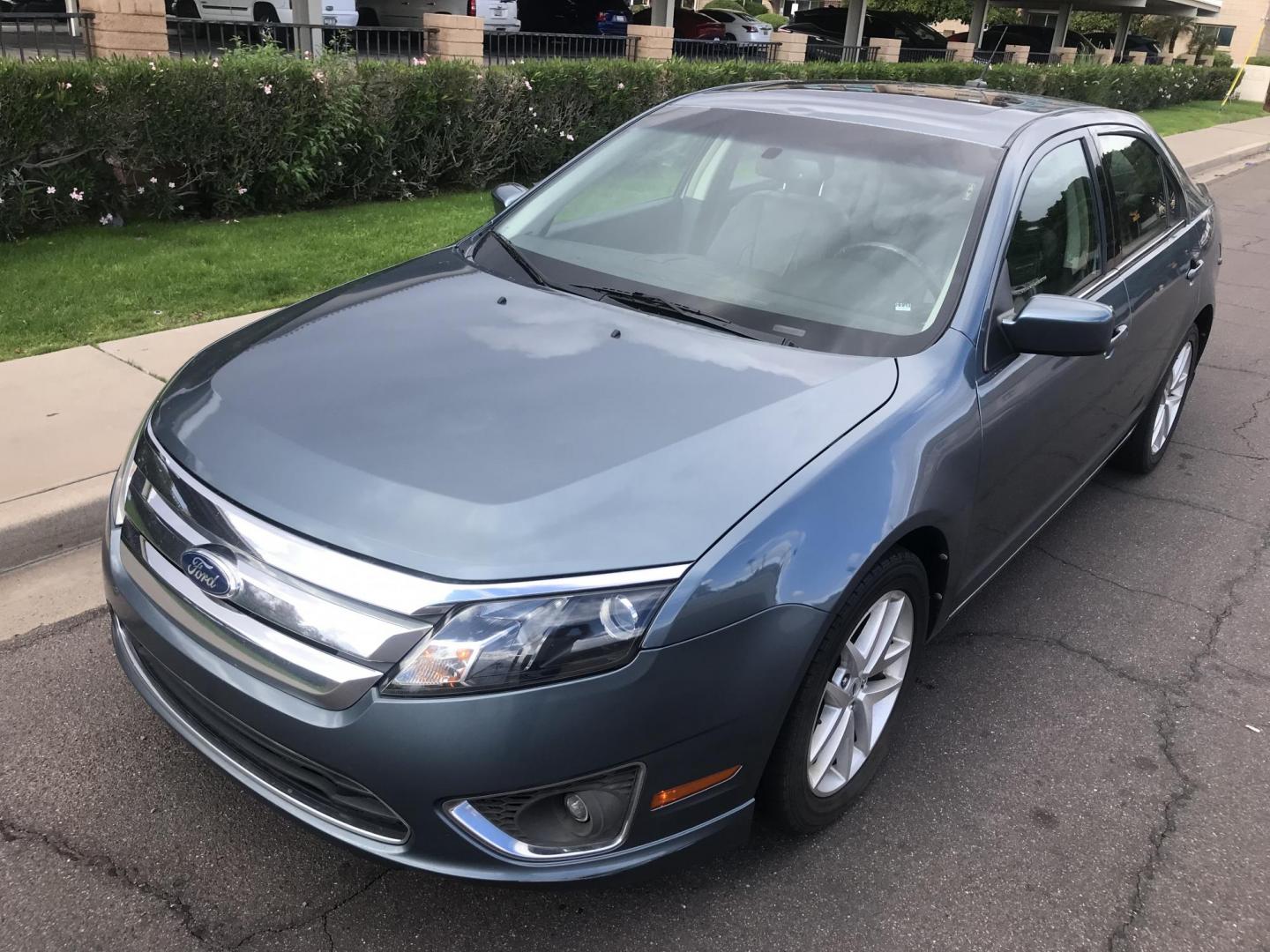 2011 BLUE /gray Ford Fusion I4 SEL (3FAHP0JA0BR) with an 2.5L L4 DOHC 16V engine, automatic transmission, located at 323 E Dunlap Ave., Phoenix, AZ, 85020, (602) 331-9000, 33.567677, -112.069000 - 2011 Ford Fusion SEL,........EXCELLENT condition, A Real Must See!!.... LOW 108k miles, Automatic, Power Options, Premium Sound CD, Ice cold ac, Clean gray interior with leather seats, clean Arizona title, Runs and Drives Excellent. Very clean inside and out, Any questions Call or text Dave 602-331- - Photo#1