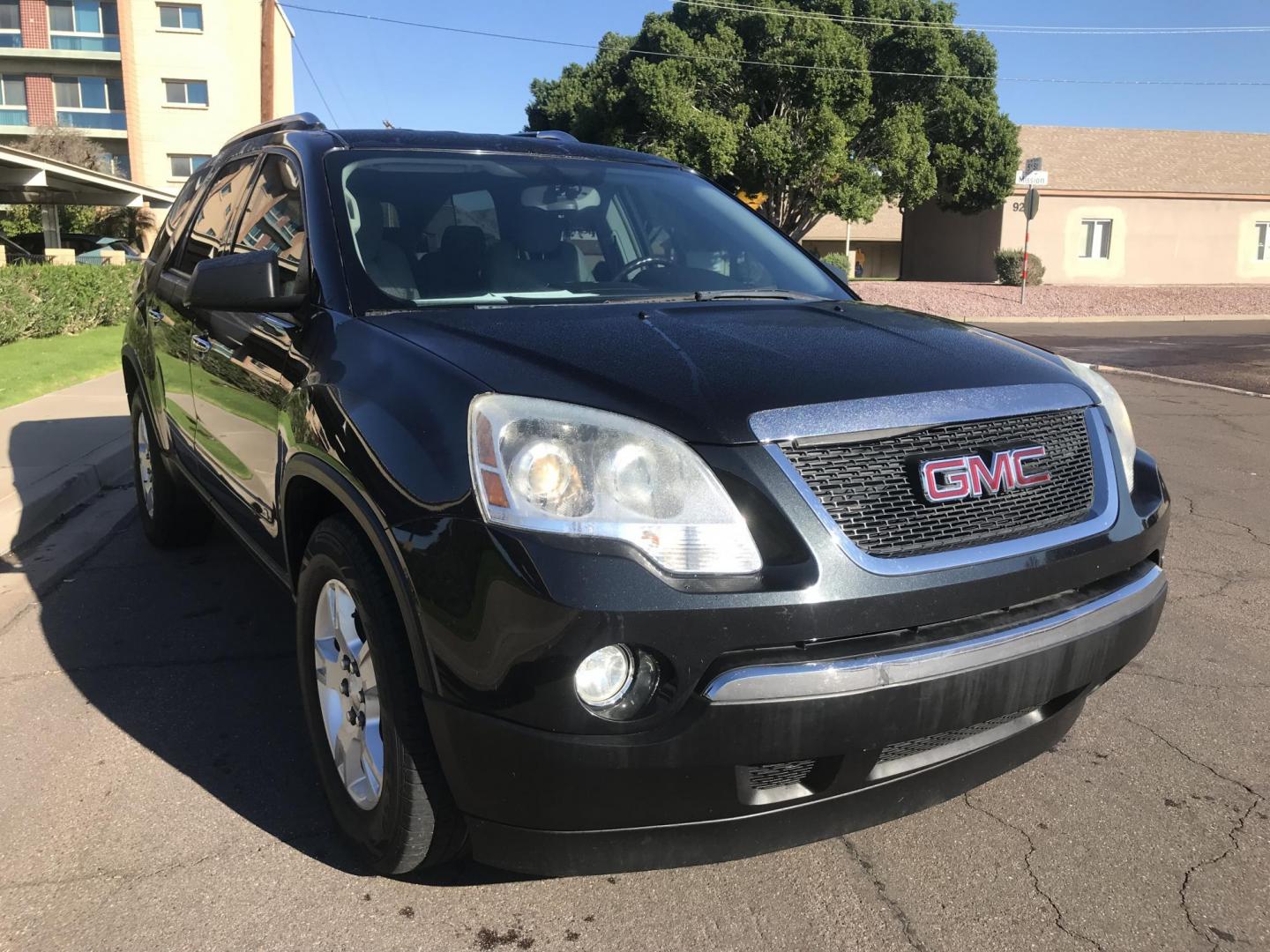 2011 black /gray GMC Acadia SLE-2 FWD (1GKKRPED6BJ) with an 3.6L V6 DOHC 24V engine, 6-Speed Automatic transmission, located at 323 E Dunlap Ave., Phoenix, AZ, 85020, (602) 331-9000, 33.567677, -112.069000 - 2011 GMC ACADIA SLE-2 ,........EXCELLENT condition, A Real Must See!!.... Automatic, 3.6L, 3RD ROW Seating, Ice cold ac, 144k miles, Clean Black interior with gray cloth seats in near perfect condition, Power Options, clean Arizona title, Runs and Drives Excellent. Very clean inside and out, Any qu - Photo#4