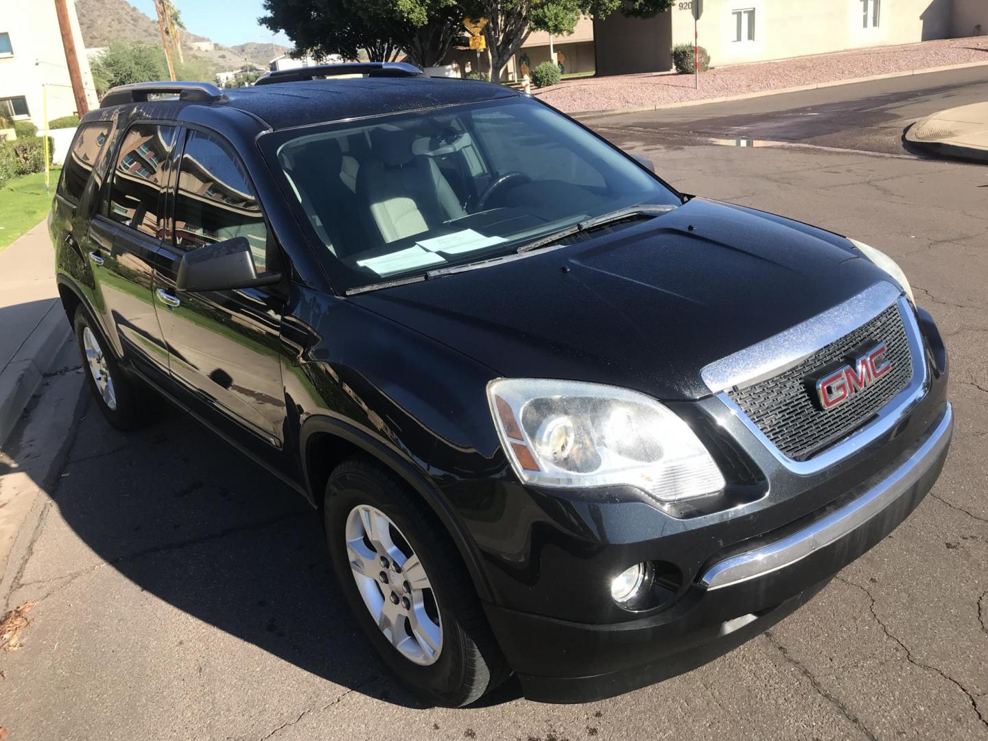 2011 black /gray GMC Acadia SLE-2 FWD (1GKKRPED6BJ) with an 3.6L V6 DOHC 24V engine, 6-Speed Automatic transmission, located at 323 E Dunlap Ave., Phoenix, AZ, 85020, (602) 331-9000, 33.567677, -112.069000 - 2011 GMC ACADIA SLE-2 ,........EXCELLENT condition, A Real Must See!!.... Automatic, 3.6L, 3RD ROW Seating, Ice cold ac, 144k miles, Clean Black interior with gray cloth seats in near perfect condition, Power Options, clean Arizona title, Runs and Drives Excellent. Very clean inside and out, Any qu - Photo#5