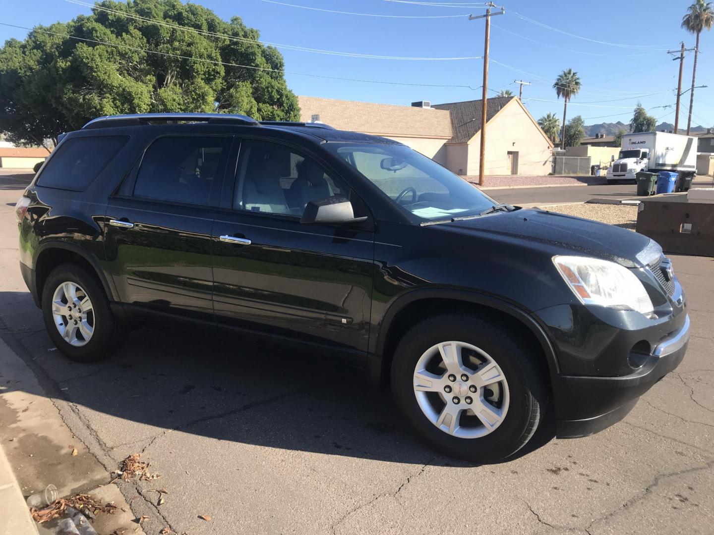 2011 black /gray GMC Acadia SLE-2 FWD (1GKKRPED6BJ) with an 3.6L V6 DOHC 24V engine, 6-Speed Automatic transmission, located at 323 E Dunlap Ave., Phoenix, AZ, 85020, (602) 331-9000, 33.567677, -112.069000 - 2011 GMC ACADIA SLE-2 ,........EXCELLENT condition, A Real Must See!!.... Automatic, 3.6L, 3RD ROW Seating, Ice cold ac, 144k miles, Clean Black interior with gray cloth seats in near perfect condition, Power Options, clean Arizona title, Runs and Drives Excellent. Very clean inside and out, Any qu - Photo#6