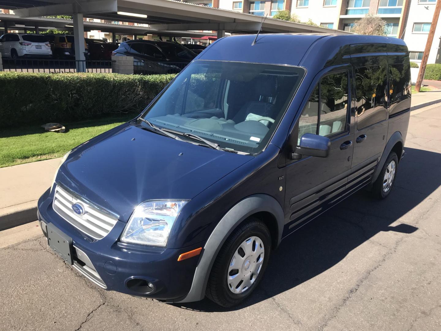 2012 BLUE /gray Ford Transit Connect XLT Premium Wagon (NM0KS9CN8CT) with an 2.0L L4 DOHC 16V engine, 4-Speed Automatic transmission, located at 323 E Dunlap Ave., Phoenix, AZ, 85020, (602) 331-9000, 33.567677, -112.069000 - 2012 FORD TRASIT CONNECT XLT PREMIUM WAGON ,.......EXCELLENT condition,.... Ice Cold A/C, Blue and gray interior with nice cloth seats in good condition, Newer Tires, Premium Sound Stereo/CD Player, This wagon is gorgeous inside and out, Super Clean!!! Runs and Drives Excellent, 158k original miles - Photo#1
