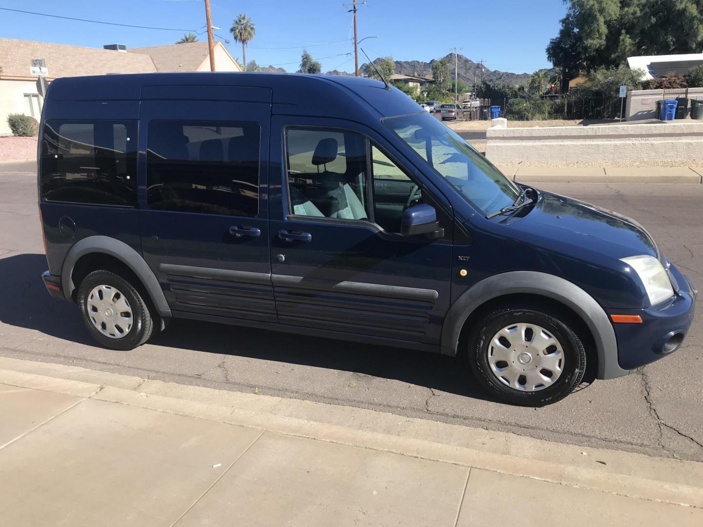 2012 BLUE /gray Ford Transit Connect XLT Premium Wagon (NM0KS9CN8CT) with an 2.0L L4 DOHC 16V engine, 4-Speed Automatic transmission, located at 323 E Dunlap Ave., Phoenix, AZ, 85020, (602) 331-9000, 33.567677, -112.069000 - 2012 FORD TRASIT CONNECT XLT PREMIUM WAGON ,.......EXCELLENT condition,.... Ice Cold A/C, Blue and gray interior with nice cloth seats in good condition, Newer Tires, Premium Sound Stereo/CD Player, This wagon is gorgeous inside and out, Super Clean!!! Runs and Drives Excellent, 158k original miles - Photo#6