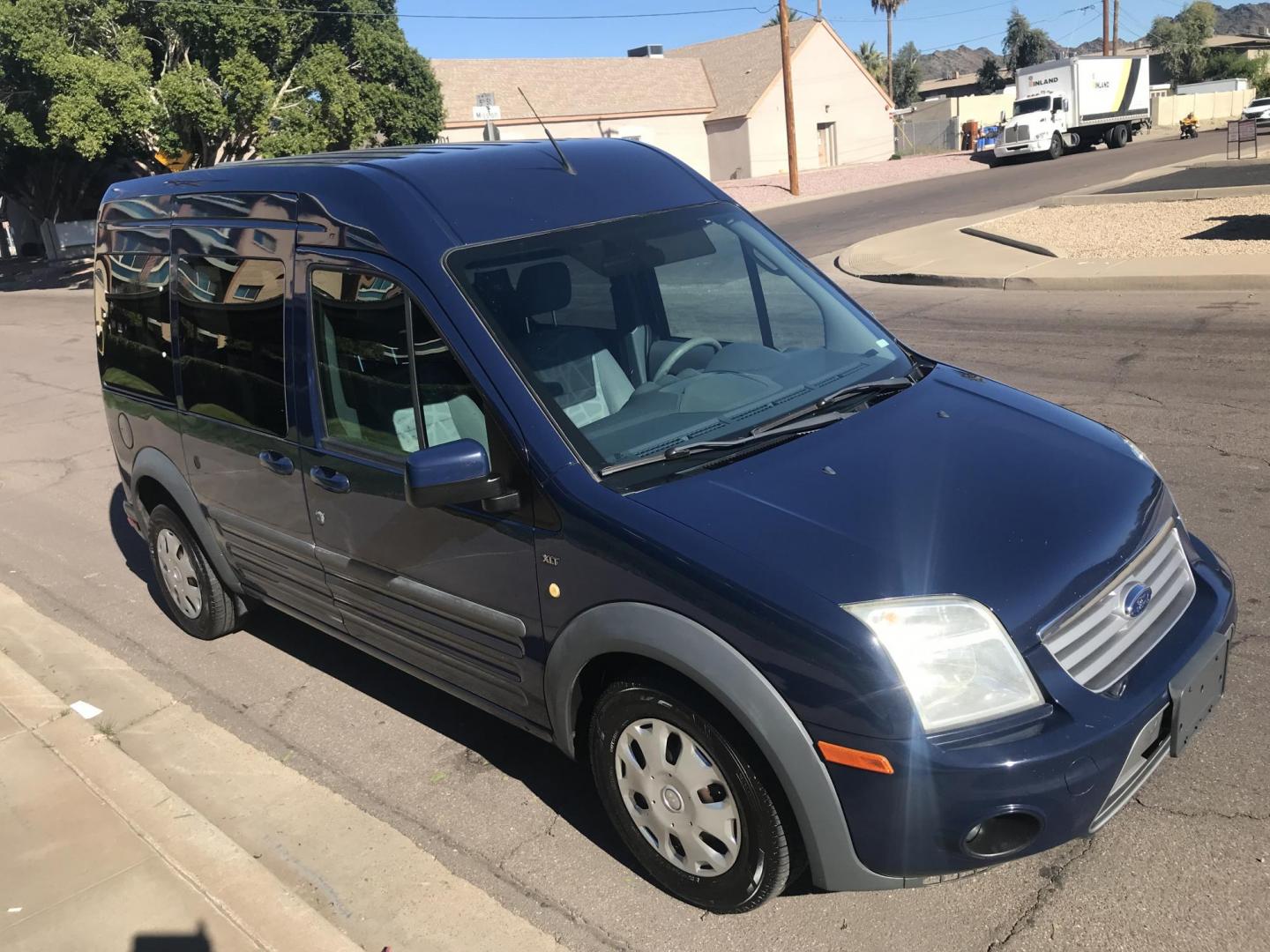 2012 BLUE /gray Ford Transit Connect XLT Premium Wagon (NM0KS9CN8CT) with an 2.0L L4 DOHC 16V engine, 4-Speed Automatic transmission, located at 323 E Dunlap Ave., Phoenix, AZ, 85020, (602) 331-9000, 33.567677, -112.069000 - 2012 FORD TRASIT CONNECT XLT PREMIUM WAGON ,.......EXCELLENT condition,.... Ice Cold A/C, Blue and gray interior with nice cloth seats in good condition, Newer Tires, Premium Sound Stereo/CD Player, This wagon is gorgeous inside and out, Super Clean!!! Runs and Drives Excellent, 158k original miles - Photo#5