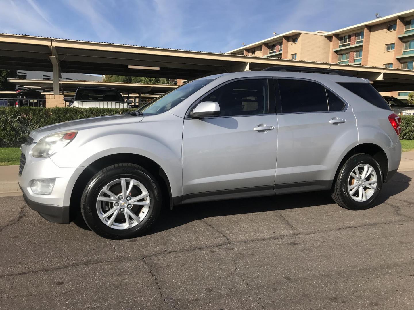 2016 silver /gray Chevrolet Equinox LT AWD (1GNFLFEK0GZ) with an 2.4L L4 DOHC 16V FFV engine, 6A transmission, located at 323 E Dunlap Ave., Phoenix, AZ, 85020, (602) 331-9000, 33.567677, -112.069000 - 2016 Chevrolet Equinox LT 4WD AWD SUV ,.......EXCELLENT condition,.... Automatic, 4cyl. 2.4L..... Ice Cold A/C, Silver and gray interior with cloth seats in near perfect condition, Backup Camera, Premiumm Sound CD, Power Options, This suv is gorgeous inside and out, Incredible gas mileage! Arizona t - Photo#2