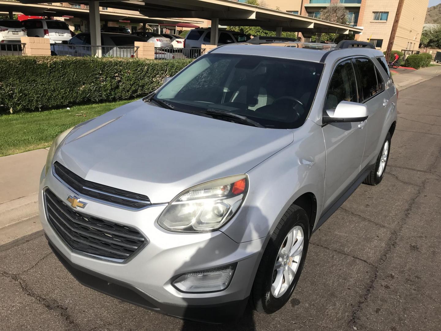 2016 silver /gray Chevrolet Equinox LT AWD (1GNFLFEK0GZ) with an 2.4L L4 DOHC 16V FFV engine, 6A transmission, located at 323 E Dunlap Ave., Phoenix, AZ, 85020, (602) 331-9000, 33.567677, -112.069000 - 2016 Chevrolet Equinox LT 4WD AWD SUV ,.......EXCELLENT condition,.... Automatic, 4cyl. 2.4L..... Ice Cold A/C, Silver and gray interior with cloth seats in near perfect condition, Backup Camera, Premiumm Sound CD, Power Options, This suv is gorgeous inside and out, Incredible gas mileage! Arizona t - Photo#1