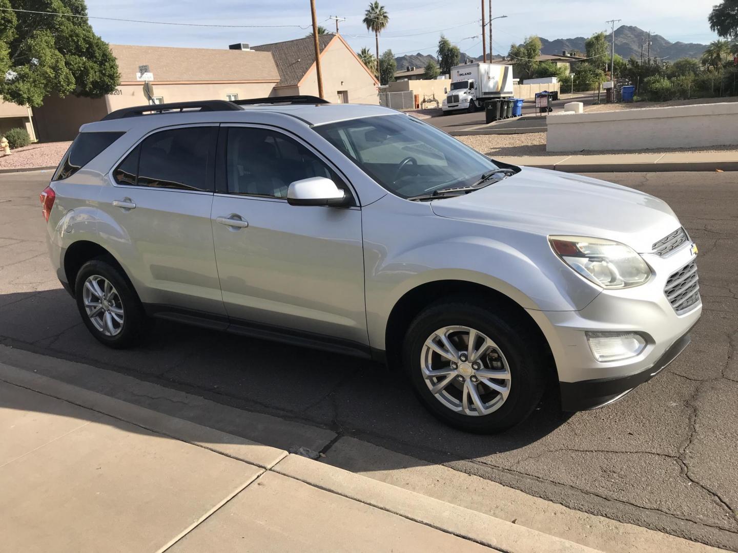2016 silver /gray Chevrolet Equinox LT AWD (1GNFLFEK0GZ) with an 2.4L L4 DOHC 16V FFV engine, 6A transmission, located at 323 E Dunlap Ave., Phoenix, AZ, 85020, (602) 331-9000, 33.567677, -112.069000 - 2016 Chevrolet Equinox LT 4WD AWD SUV ,.......EXCELLENT condition,.... Automatic, 4cyl. 2.4L..... Ice Cold A/C, Silver and gray interior with cloth seats in near perfect condition, Backup Camera, Premiumm Sound CD, Power Options, This suv is gorgeous inside and out, Incredible gas mileage! Arizona t - Photo#6