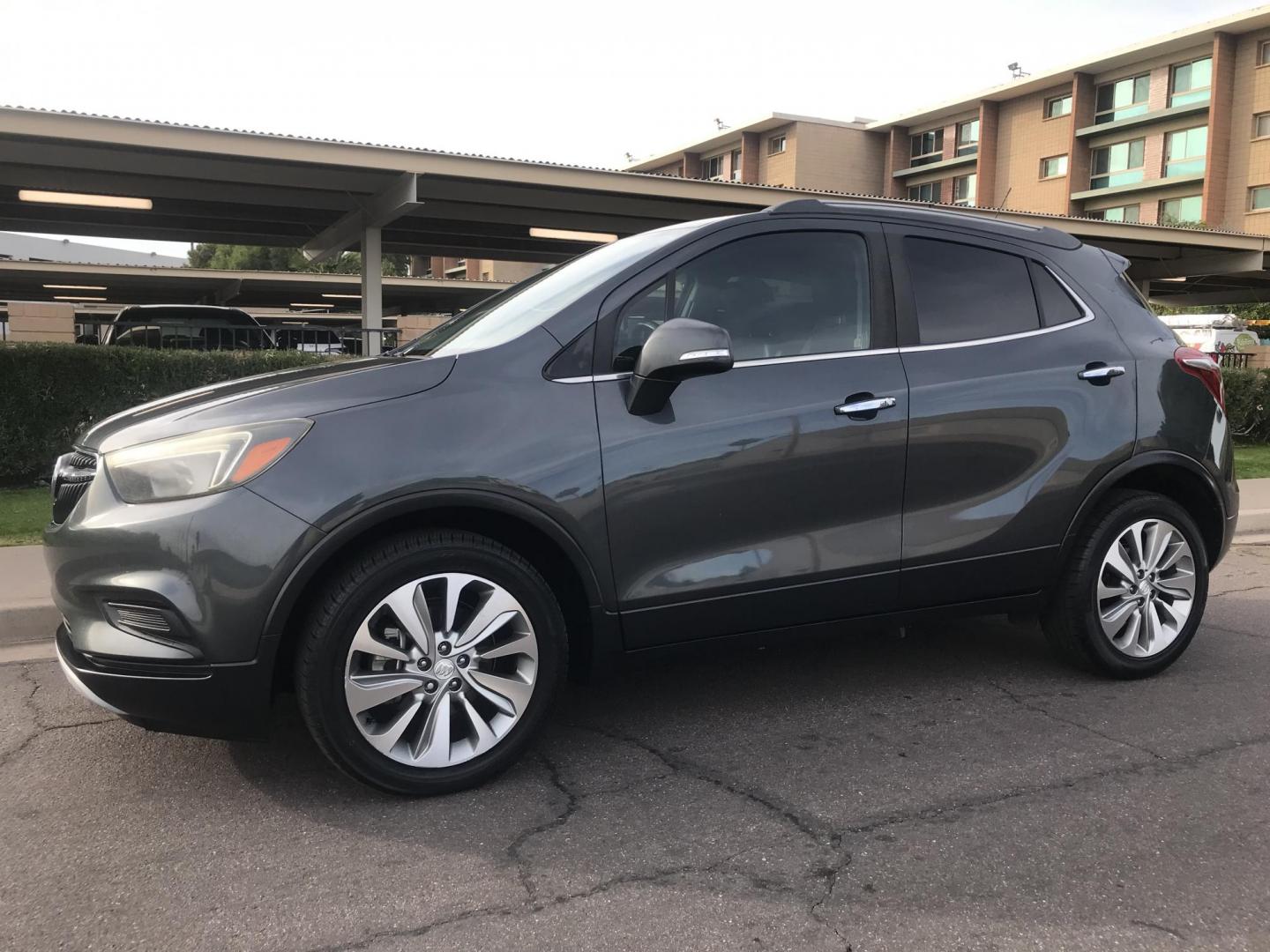 2017 gray /gray and black Buick Encore Preferred FWD (KL4CJASBXHB) with an 1.4L L4 DOHC 16V TURBO engine, 6A transmission, located at 323 E Dunlap Ave., Phoenix, AZ, 85020, (602) 331-9000, 33.567677, -112.069000 - 2017 BUICK ENCORE SUV ........ Automatic, 1.4T Engine, with LOW 125k miles, Cold AC. Power Options, Premium Sound Stereo/ CD Player, Beautiful Gray Exterior with black leather seats, Backup Camera, Alloy Wheels, Clean title , Runs and Drives great . passed emissions. Priced to sell @ $7000 CASH PRIC - Photo#2