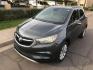 2017 gray /gray and black Buick Encore Preferred FWD (KL4CJASBXHB) with an 1.4L L4 DOHC 16V TURBO engine, 6A transmission, located at 323 E Dunlap Ave., Phoenix, AZ, 85020, (602) 331-9000, 33.567677, -112.069000 - 2017 BUICK ENCORE SUV ........ Automatic, 1.4T Engine, with LOW 125k miles, Cold AC. Power Options, Premium Sound Stereo/ CD Player, Beautiful Gray Exterior with black leather seats, Backup Camera, Alloy Wheels, Clean title , Runs and Drives great . passed emissions. Priced to sell @ $7000 CASH PRIC - Photo#1