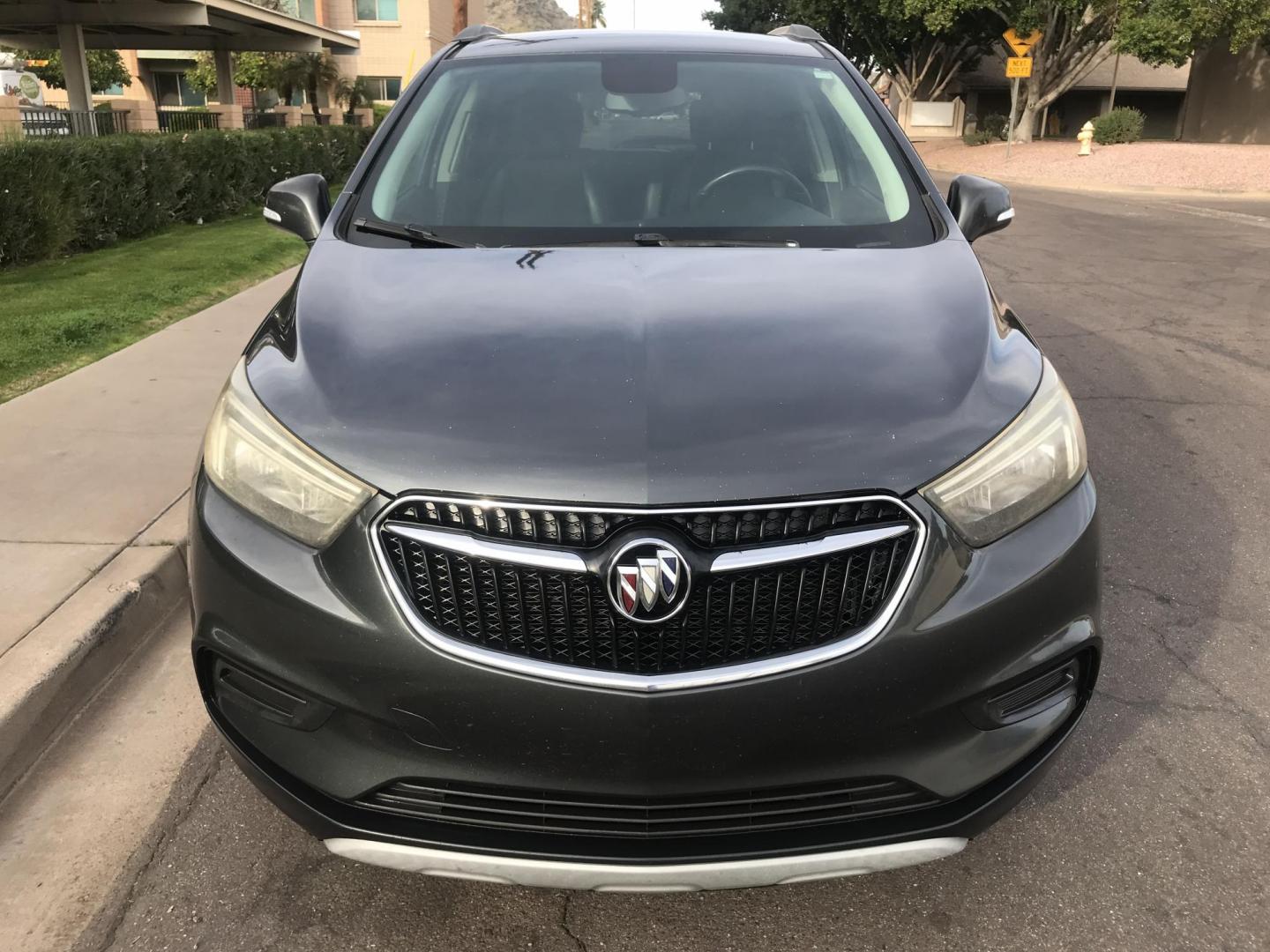 2017 gray /gray and black Buick Encore Preferred FWD (KL4CJASBXHB) with an 1.4L L4 DOHC 16V TURBO engine, 6A transmission, located at 323 E Dunlap Ave., Phoenix, AZ, 85020, (602) 331-9000, 33.567677, -112.069000 - 2017 BUICK ENCORE SUV ........ Automatic, 1.4T Engine, with LOW 125k miles, Cold AC. Power Options, Premium Sound Stereo/ CD Player, Beautiful Gray Exterior with black leather seats, Backup Camera, Alloy Wheels, Clean title , Runs and Drives great . passed emissions. Priced to sell @ $7000 CASH PRIC - Photo#3