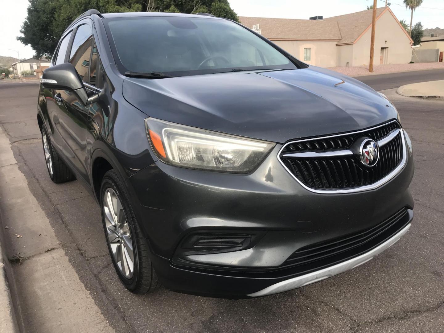 2017 gray /gray and black Buick Encore Preferred FWD (KL4CJASBXHB) with an 1.4L L4 DOHC 16V TURBO engine, 6A transmission, located at 323 E Dunlap Ave., Phoenix, AZ, 85020, (602) 331-9000, 33.567677, -112.069000 - 2017 BUICK ENCORE SUV ........ Automatic, 1.4T Engine, with LOW 125k miles, Cold AC. Power Options, Premium Sound Stereo/ CD Player, Beautiful Gray Exterior with black leather seats, Backup Camera, Alloy Wheels, Clean title , Runs and Drives great . passed emissions. Priced to sell @ $7000 CASH PRIC - Photo#4
