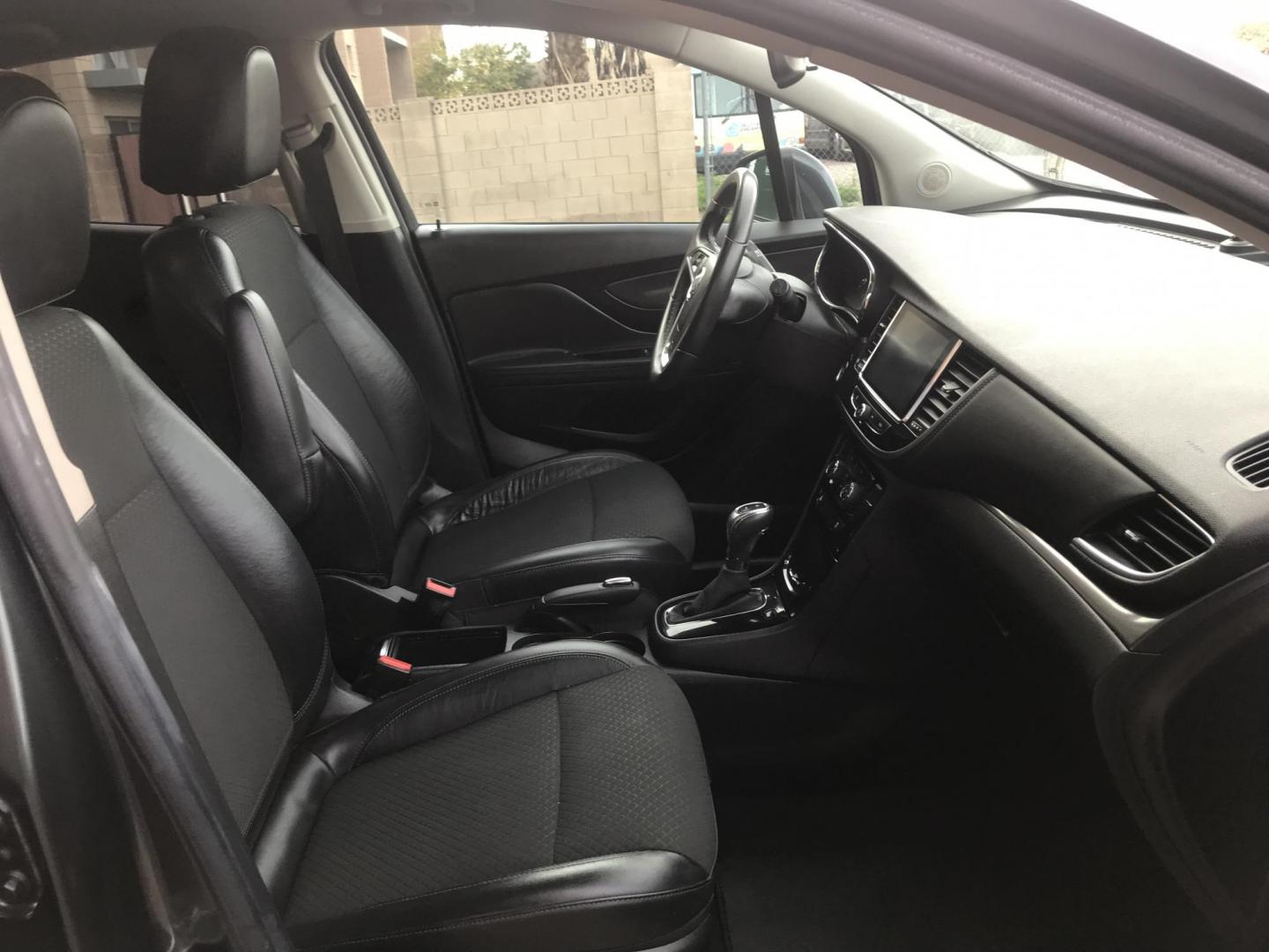 2017 gray /gray and black Buick Encore Preferred FWD (KL4CJASBXHB) with an 1.4L L4 DOHC 16V TURBO engine, 6A transmission, located at 323 E Dunlap Ave., Phoenix, AZ, 85020, (602) 331-9000, 33.567677, -112.069000 - 2017 BUICK ENCORE SUV ........ Automatic, 1.4T Engine, with LOW 125k miles, Cold AC. Power Options, Premium Sound Stereo/ CD Player, Beautiful Gray Exterior with black leather seats, Backup Camera, Alloy Wheels, Clean title , Runs and Drives great . passed emissions. Priced to sell @ $7000 CASH PRIC - Photo#8