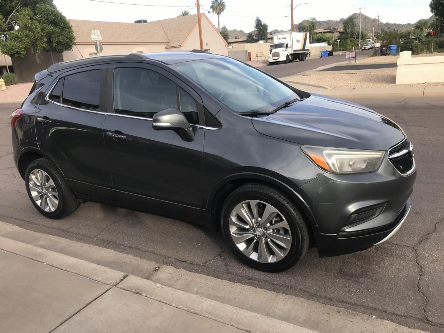 2017 gray /gray and black Buick Encore Preferred FWD (KL4CJASBXHB) with an 1.4L L4 DOHC 16V TURBO engine, 6A transmission, located at 323 E Dunlap Ave., Phoenix, AZ, 85020, (602) 331-9000, 33.567677, -112.069000 - 2017 BUICK ENCORE SUV ........ Automatic, 1.4T Engine, with LOW 125k miles, Cold AC. Power Options, Premium Sound Stereo/ CD Player, Beautiful Gray Exterior with black leather seats, Backup Camera, Alloy Wheels, Clean title , Runs and Drives great . passed emissions. Priced to sell @ $7000 CASH PRIC - Photo#6
