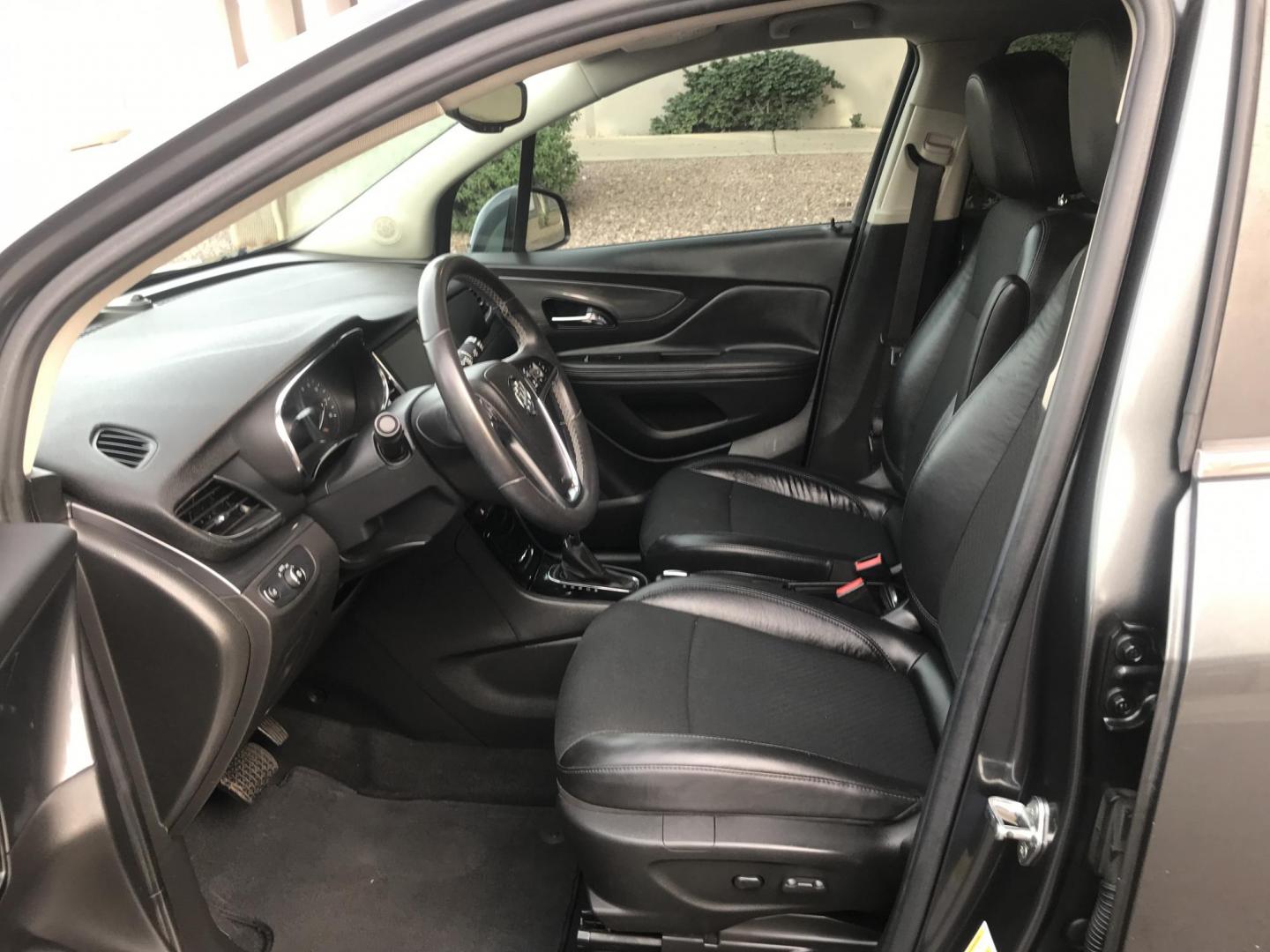 2017 gray /gray and black Buick Encore Preferred FWD (KL4CJASBXHB) with an 1.4L L4 DOHC 16V TURBO engine, 6A transmission, located at 323 E Dunlap Ave., Phoenix, AZ, 85020, (602) 331-9000, 33.567677, -112.069000 - 2017 BUICK ENCORE SUV ........ Automatic, 1.4T Engine, with LOW 125k miles, Cold AC. Power Options, Premium Sound Stereo/ CD Player, Beautiful Gray Exterior with black leather seats, Backup Camera, Alloy Wheels, Clean title , Runs and Drives great . passed emissions. Priced to sell @ $7000 CASH PRIC - Photo#13