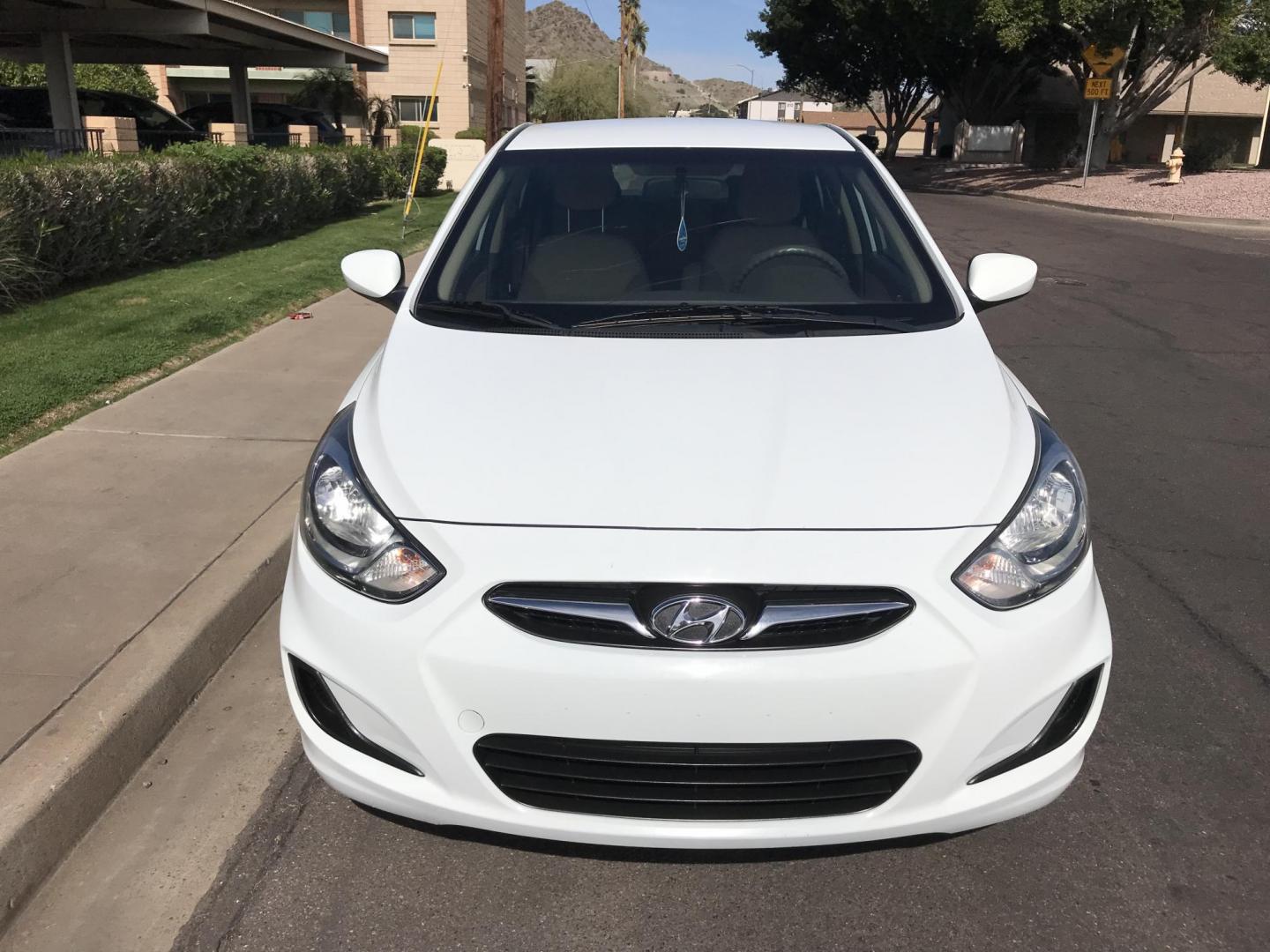 2013 WHITE /tan Hyundai Accent GLS 4-Door (KMHCT4AE7DU) with an 1.6L L4 DOHC 16V engine, located at 323 E Dunlap Ave., Phoenix, AZ, 85020, (602) 331-9000, 33.567677, -112.069000 - 2013 Hyundai Accent GLS , Automatic, 1.6L , 4cyl. Super Economical ............ Low 120k miles, .... A Must See!! ....... Ice cold AC...... The car is gorgeous inside and out. Power windows, Power door locks, Premium Stereo/CD Player, Beautiful White and black interior with tan cloth seats, Clean Ar - Photo#3
