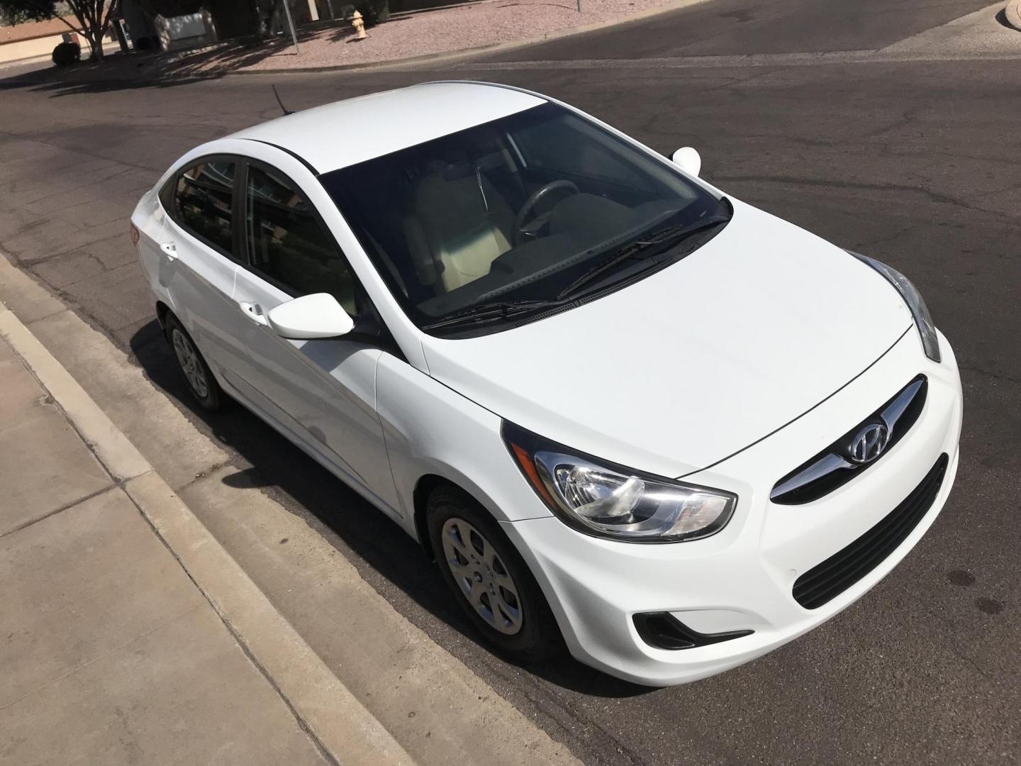 2013 WHITE /tan Hyundai Accent GLS 4-Door (KMHCT4AE7DU) with an 1.6L L4 DOHC 16V engine, located at 323 E Dunlap Ave., Phoenix, AZ, 85020, (602) 331-9000, 33.567677, -112.069000 - 2013 Hyundai Accent GLS , Automatic, 1.6L , 4cyl. Super Economical ............ Low 120k miles, .... A Must See!! ....... Ice cold AC...... The car is gorgeous inside and out. Power windows, Power door locks, Premium Stereo/CD Player, Beautiful White and black interior with tan cloth seats, Clean Ar - Photo#5