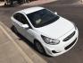 2013 WHITE /tan Hyundai Accent GLS 4-Door (KMHCT4AE7DU) with an 1.6L L4 DOHC 16V engine, located at 323 E Dunlap Ave., Phoenix, AZ, 85020, (602) 331-9000, 33.567677, -112.069000 - 2013 Hyundai Accent GLS , Automatic, 1.6L , 4cyl. Super Economical ............ Low 120k miles, .... A Must See!! ....... Ice cold AC...... The car is gorgeous inside and out. Power windows, Power door locks, Premium Stereo/CD Player, Beautiful White and black interior with tan cloth seats, Clean Ar - Photo#5