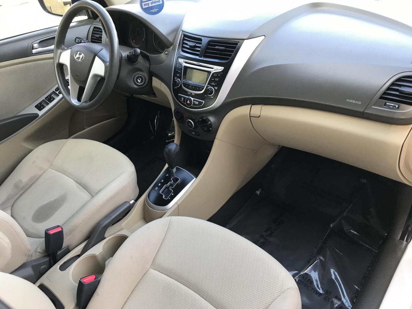 2013 WHITE /tan Hyundai Accent GLS 4-Door (KMHCT4AE7DU) with an 1.6L L4 DOHC 16V engine, located at 323 E Dunlap Ave., Phoenix, AZ, 85020, (602) 331-9000, 33.567677, -112.069000 - 2013 Hyundai Accent GLS , Automatic, 1.6L , 4cyl. Super Economical ............ Low 120k miles, .... A Must See!! ....... Ice cold AC...... The car is gorgeous inside and out. Power windows, Power door locks, Premium Stereo/CD Player, Beautiful White and black interior with tan cloth seats, Clean Ar - Photo#7