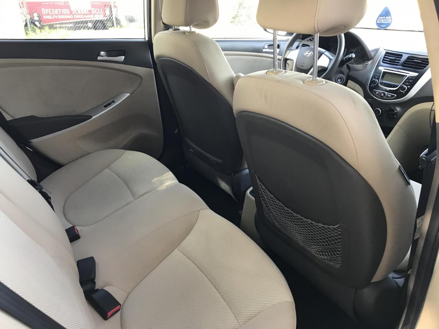 2013 WHITE /tan Hyundai Accent GLS 4-Door (KMHCT4AE7DU) with an 1.6L L4 DOHC 16V engine, located at 323 E Dunlap Ave., Phoenix, AZ, 85020, (602) 331-9000, 33.567677, -112.069000 - 2013 Hyundai Accent GLS , Automatic, 1.6L , 4cyl. Super Economical ............ Low 120k miles, .... A Must See!! ....... Ice cold AC...... The car is gorgeous inside and out. Power windows, Power door locks, Premium Stereo/CD Player, Beautiful White and black interior with tan cloth seats, Clean Ar - Photo#9