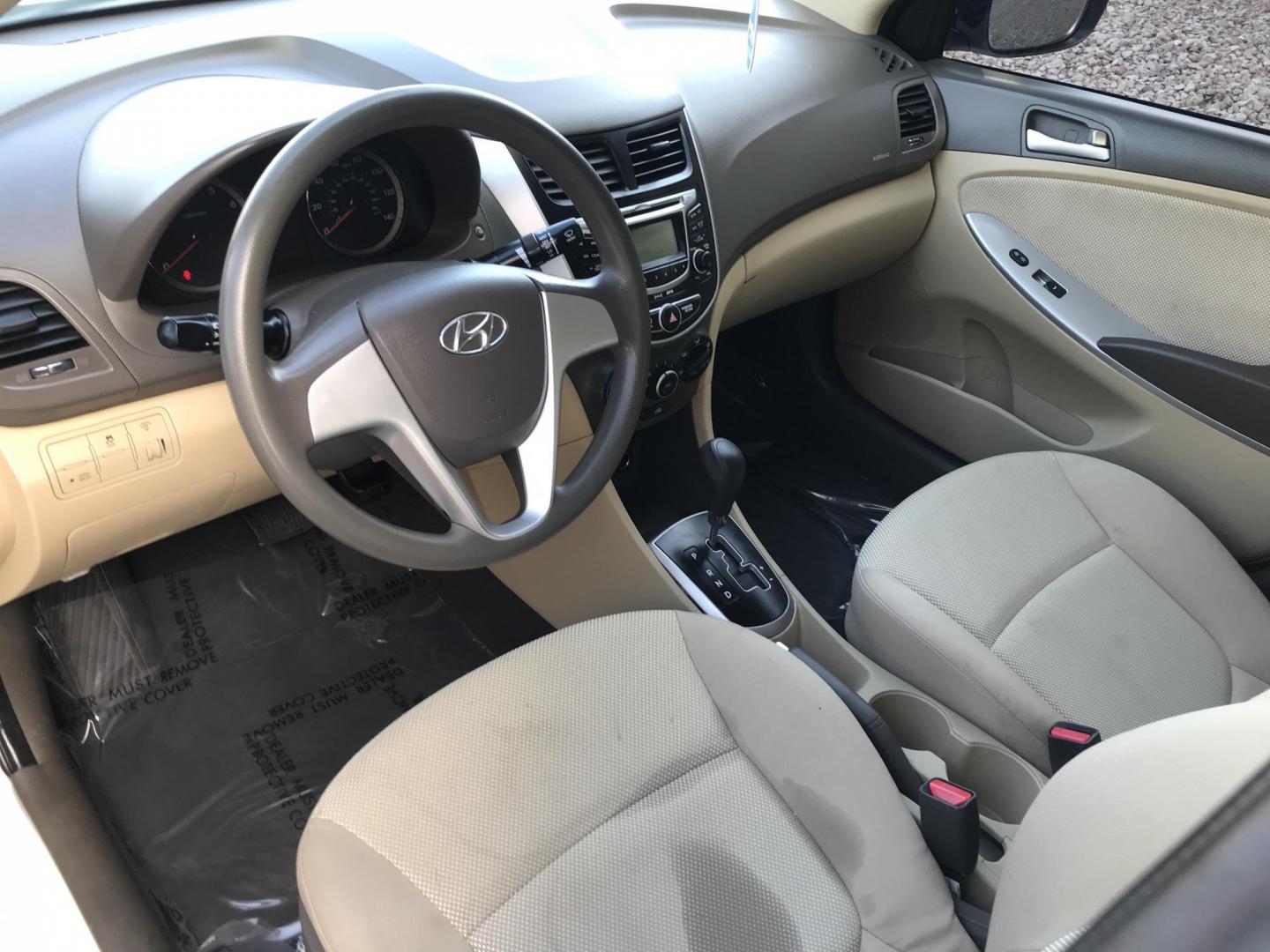2013 WHITE /tan Hyundai Accent GLS 4-Door (KMHCT4AE7DU) with an 1.6L L4 DOHC 16V engine, located at 323 E Dunlap Ave., Phoenix, AZ, 85020, (602) 331-9000, 33.567677, -112.069000 - 2013 Hyundai Accent GLS , Automatic, 1.6L , 4cyl. Super Economical ............ Low 120k miles, .... A Must See!! ....... Ice cold AC...... The car is gorgeous inside and out. Power windows, Power door locks, Premium Stereo/CD Player, Beautiful White and black interior with tan cloth seats, Clean Ar - Photo#12