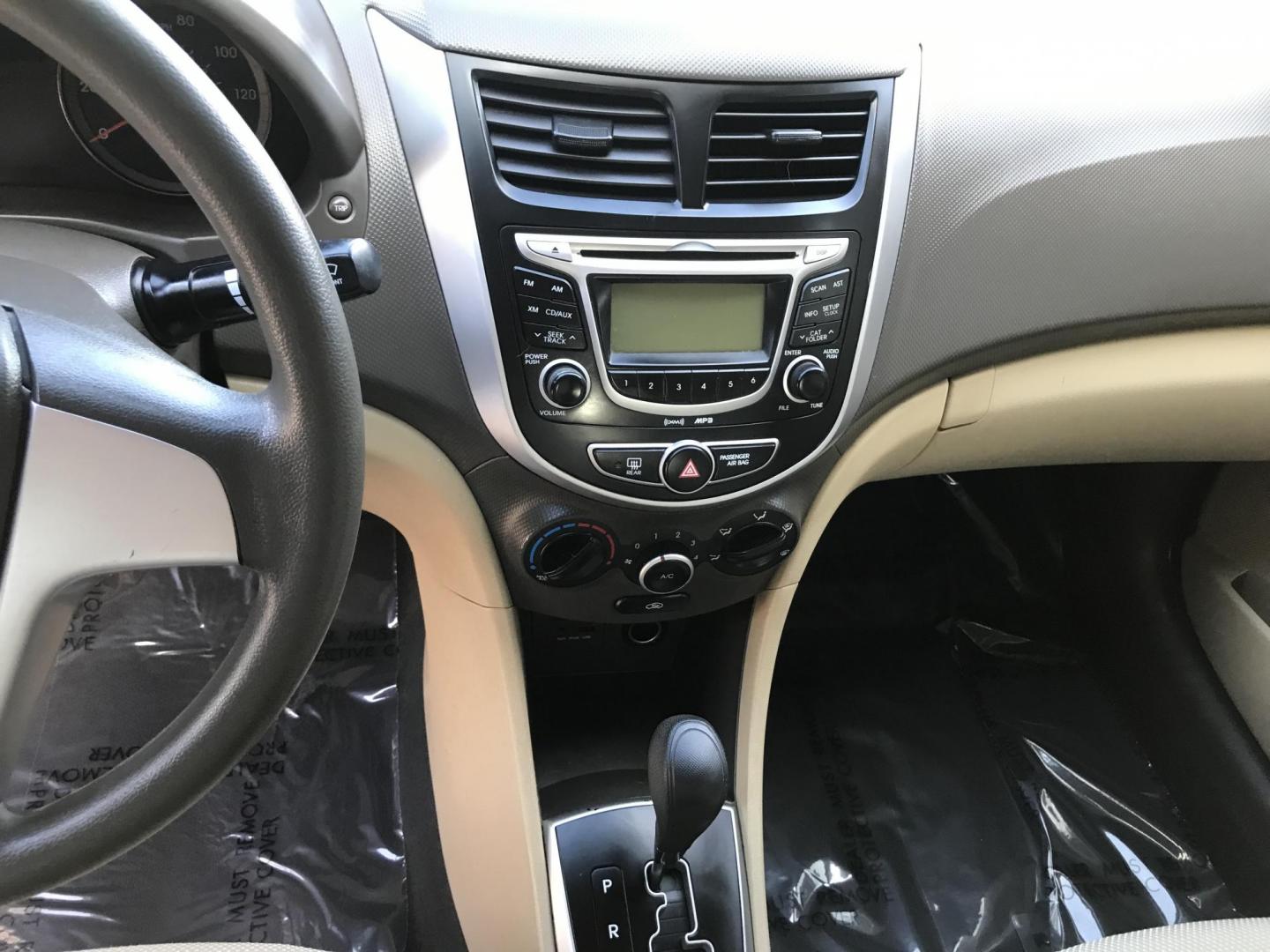 2013 WHITE /tan Hyundai Accent GLS 4-Door (KMHCT4AE7DU) with an 1.6L L4 DOHC 16V engine, located at 323 E Dunlap Ave., Phoenix, AZ, 85020, (602) 331-9000, 33.567677, -112.069000 - 2013 Hyundai Accent GLS , Automatic, 1.6L , 4cyl. Super Economical ............ Low 120k miles, .... A Must See!! ....... Ice cold AC...... The car is gorgeous inside and out. Power windows, Power door locks, Premium Stereo/CD Player, Beautiful White and black interior with tan cloth seats, Clean Ar - Photo#14