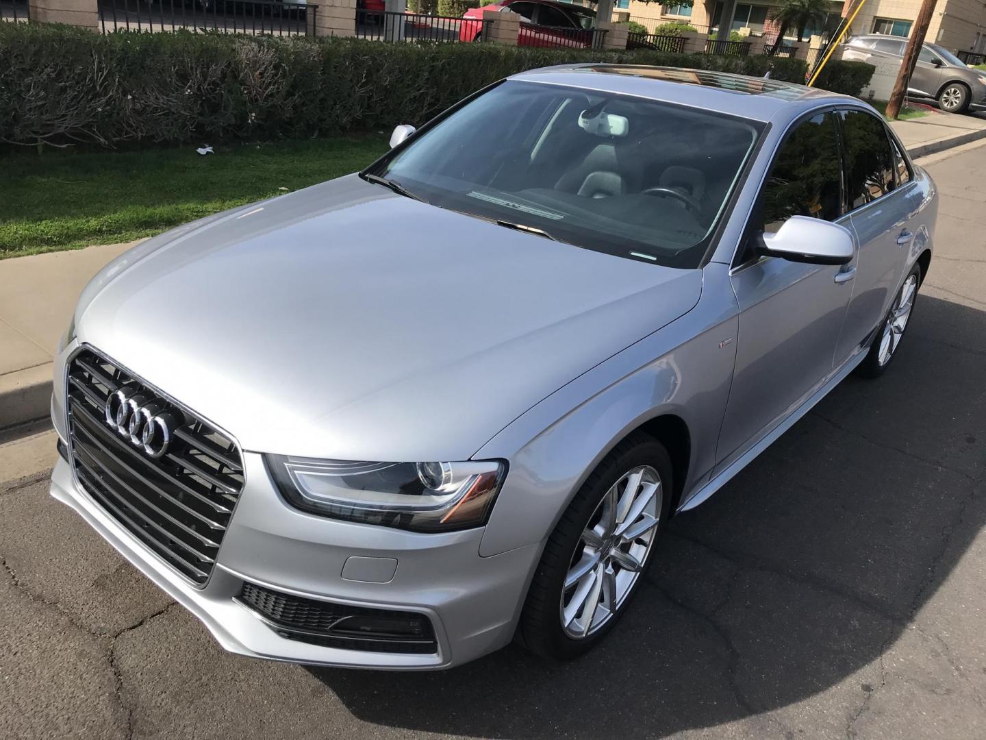 2015 silver /black Audi A4 2.0T Premium Sedan quattro Manual (WAUFFAFL2FN) with an 2.0L L4 DOHC 16V TURBO engine, 6-Speed Manual transmission, located at 323 E Dunlap Ave., Phoenix, AZ, 85020, (602) 331-9000, 33.567677, -112.069000 - Luxury 2015 AUDI A4 QUATTRO AWD ..... A MUST SEE !!!! ........ Automatic, 2.0L Turbo Charged Engine, 143k miles, Cold AC. Loaded with Power Options, Premium Sound Stereo/ CD Player, Beautiful Silver Exterior with black leather seats, Backup Camera, Sunroof, Alloy Wheels, Good Tires, Clean title , Ru - Photo#0