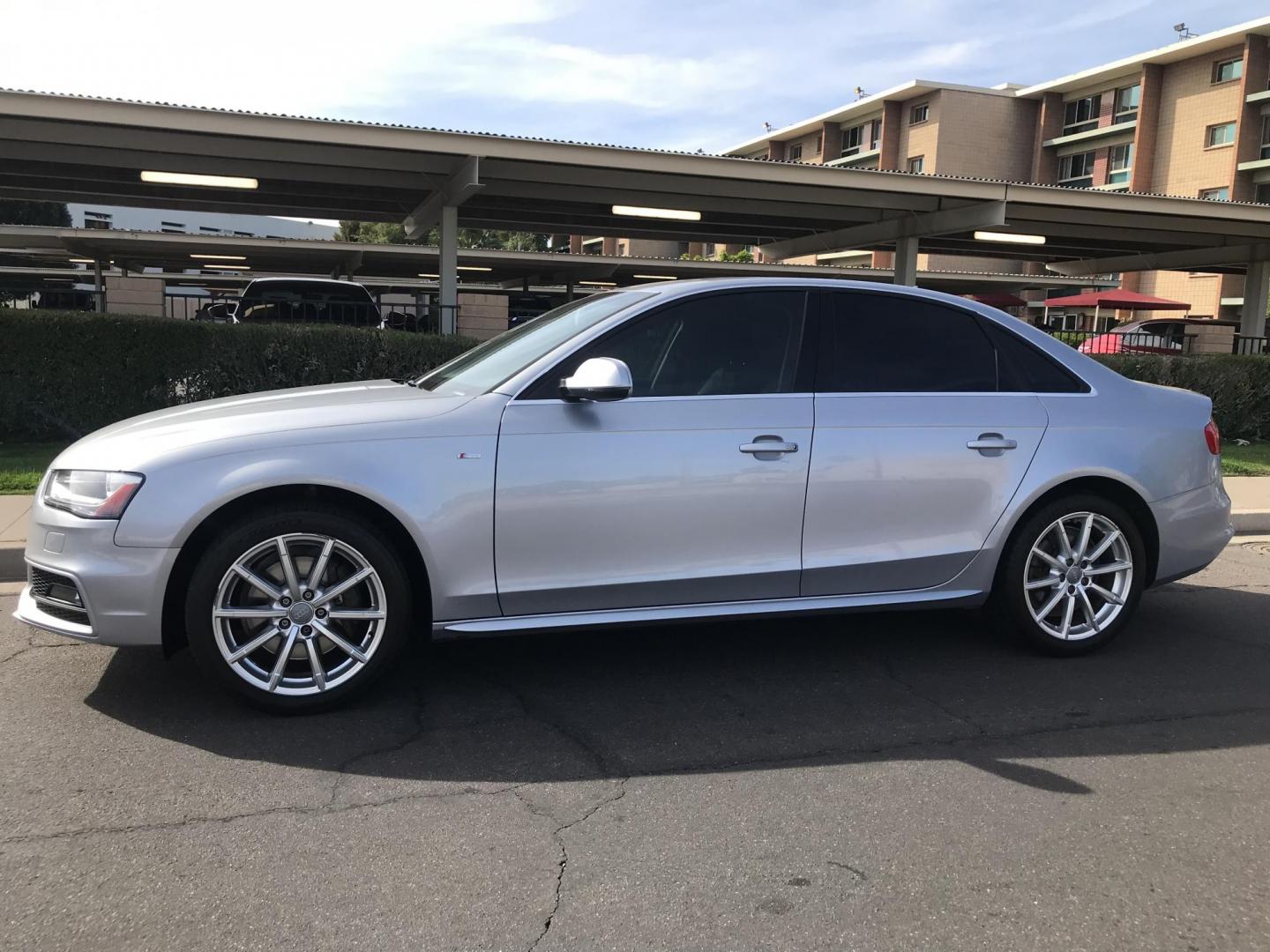 2015 silver /black Audi A4 2.0T Premium Sedan quattro Manual (WAUFFAFL2FN) with an 2.0L L4 DOHC 16V TURBO engine, 6-Speed Manual transmission, located at 323 E Dunlap Ave., Phoenix, AZ, 85020, (602) 331-9000, 33.567677, -112.069000 - Luxury 2015 AUDI A4 QUATTRO AWD ..... A MUST SEE !!!! ........ Automatic, 2.0L Turbo Charged Engine, 143k miles, Cold AC. Loaded with Power Options, Premium Sound Stereo/ CD Player, Beautiful Silver Exterior with black leather seats, Backup Camera, Sunroof, Alloy Wheels, Good Tires, Clean title , Ru - Photo#2