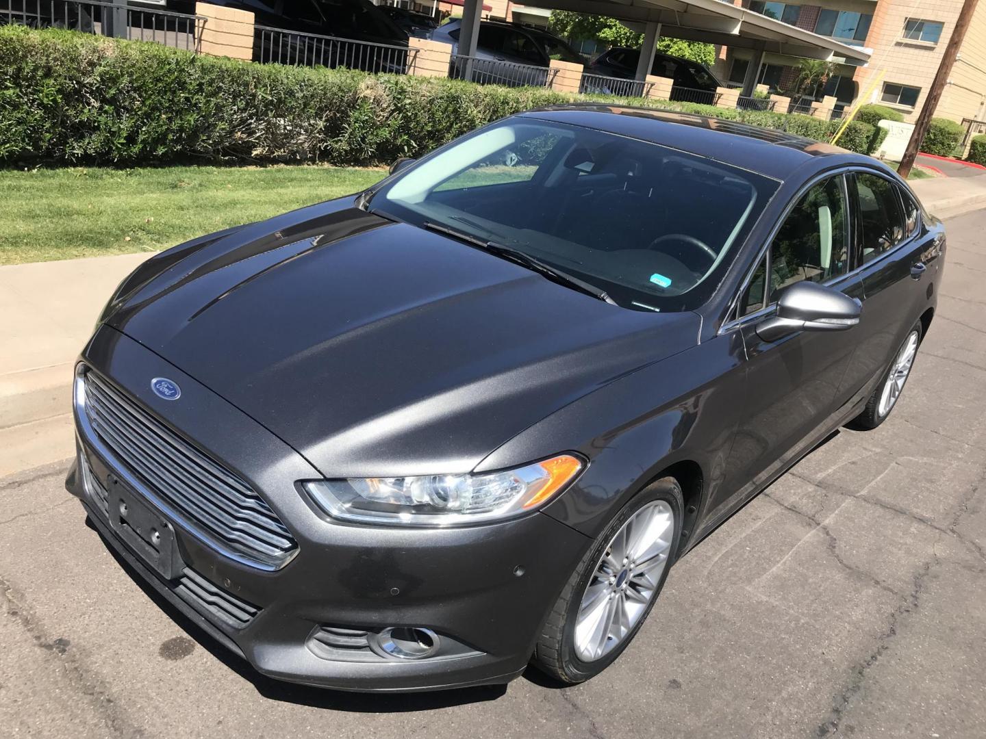 2015 gray /gray Ford Fusion SE (3FA6P0H9XFR) with an 2.0L L4 DOHC 16V engine, located at 323 E Dunlap Ave., Phoenix, AZ, 85020, (602) 331-9000, 33.567677, -112.069000 - 2015 Ford Fusion SE,........great condition, .... 141k miles, Automatic, Power Options, Premium Sound CD, Ice cold ac, Alloy Wheels, Security System, clean Arizona title, Runs and Drives Excellent. Very clean inside and out, Economical/ Gas saver..... Any questions Call or text Dave 602-331-900 - Photo#1