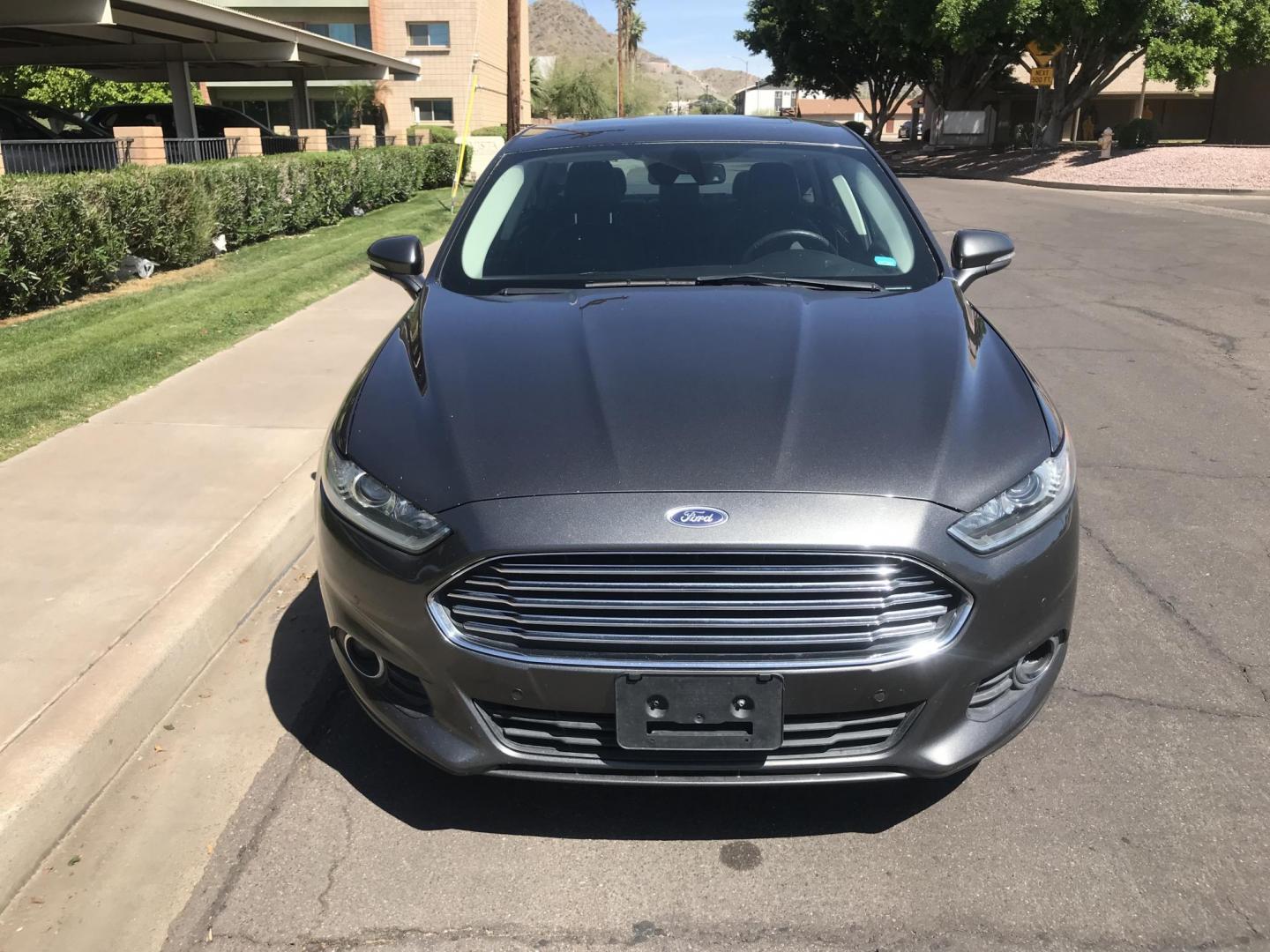 2015 gray /gray Ford Fusion SE (3FA6P0H9XFR) with an 2.0L L4 DOHC 16V engine, located at 323 E Dunlap Ave., Phoenix, AZ, 85020, (602) 331-9000, 33.567677, -112.069000 - 2015 Ford Fusion SE,........great condition, .... 141k miles, Automatic, Power Options, Premium Sound CD, Ice cold ac, Alloy Wheels, Security System, clean Arizona title, Runs and Drives Excellent. Very clean inside and out, Economical/ Gas saver..... Any questions Call or text Dave 602-331-900 - Photo#3
