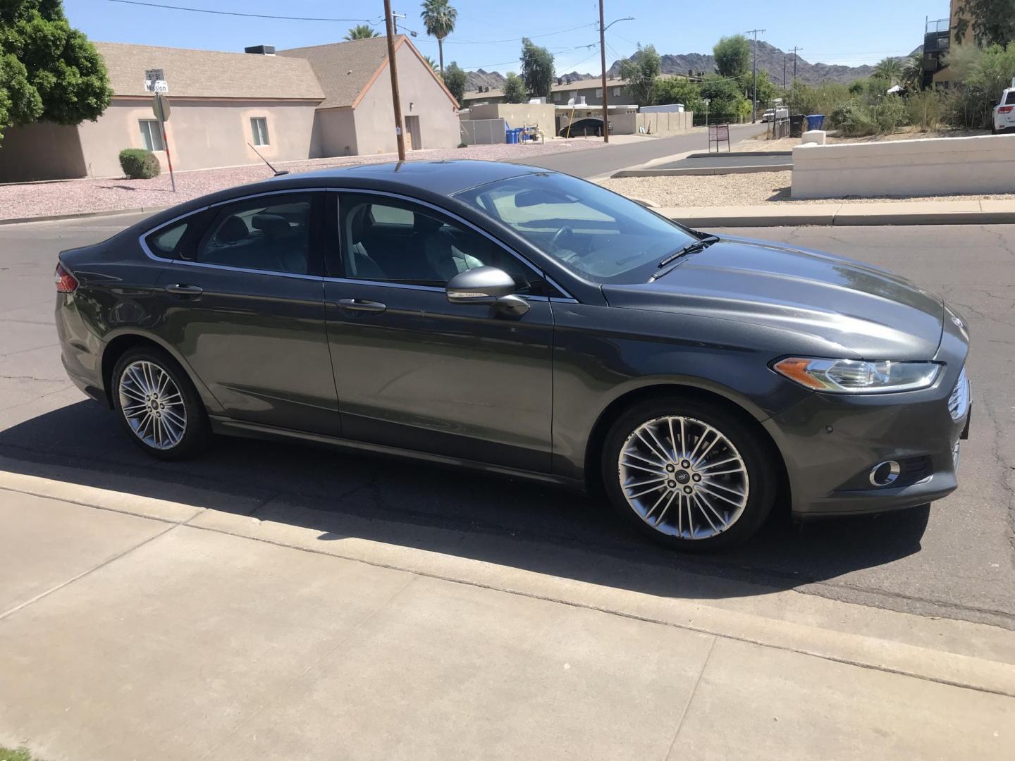 2015 gray /gray Ford Fusion SE (3FA6P0H9XFR) with an 2.0L L4 DOHC 16V engine, located at 323 E Dunlap Ave., Phoenix, AZ, 85020, (602) 331-9000, 33.567677, -112.069000 - 2015 Ford Fusion SE,........great condition, .... 141k miles, Automatic, Power Options, Premium Sound CD, Ice cold ac, Alloy Wheels, Security System, clean Arizona title, Runs and Drives Excellent. Very clean inside and out, Economical/ Gas saver..... Any questions Call or text Dave 602-331-900 - Photo#6